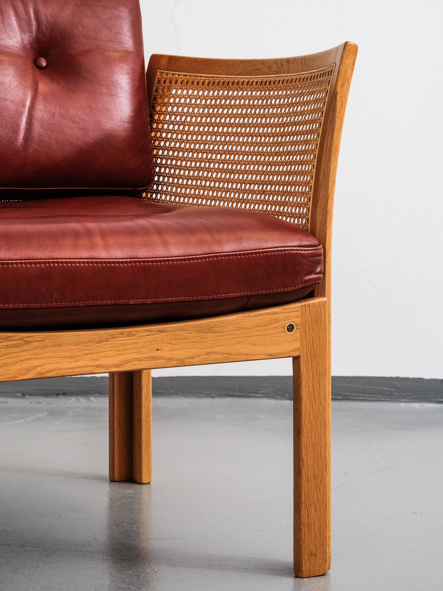 Scandinavian Modern Pair of Illum Wikkelsø 'Plexus' Easy Chairs in Oak and Coqnac Leather, 1960s