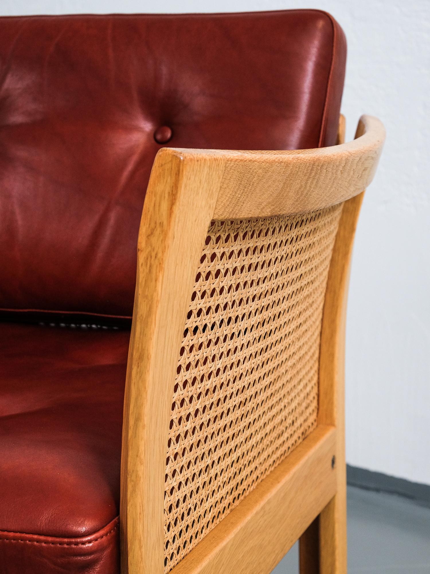 Danish Pair of Illum Wikkelsø 'Plexus' Easy Chairs in Oak and Coqnac Leather, 1960s