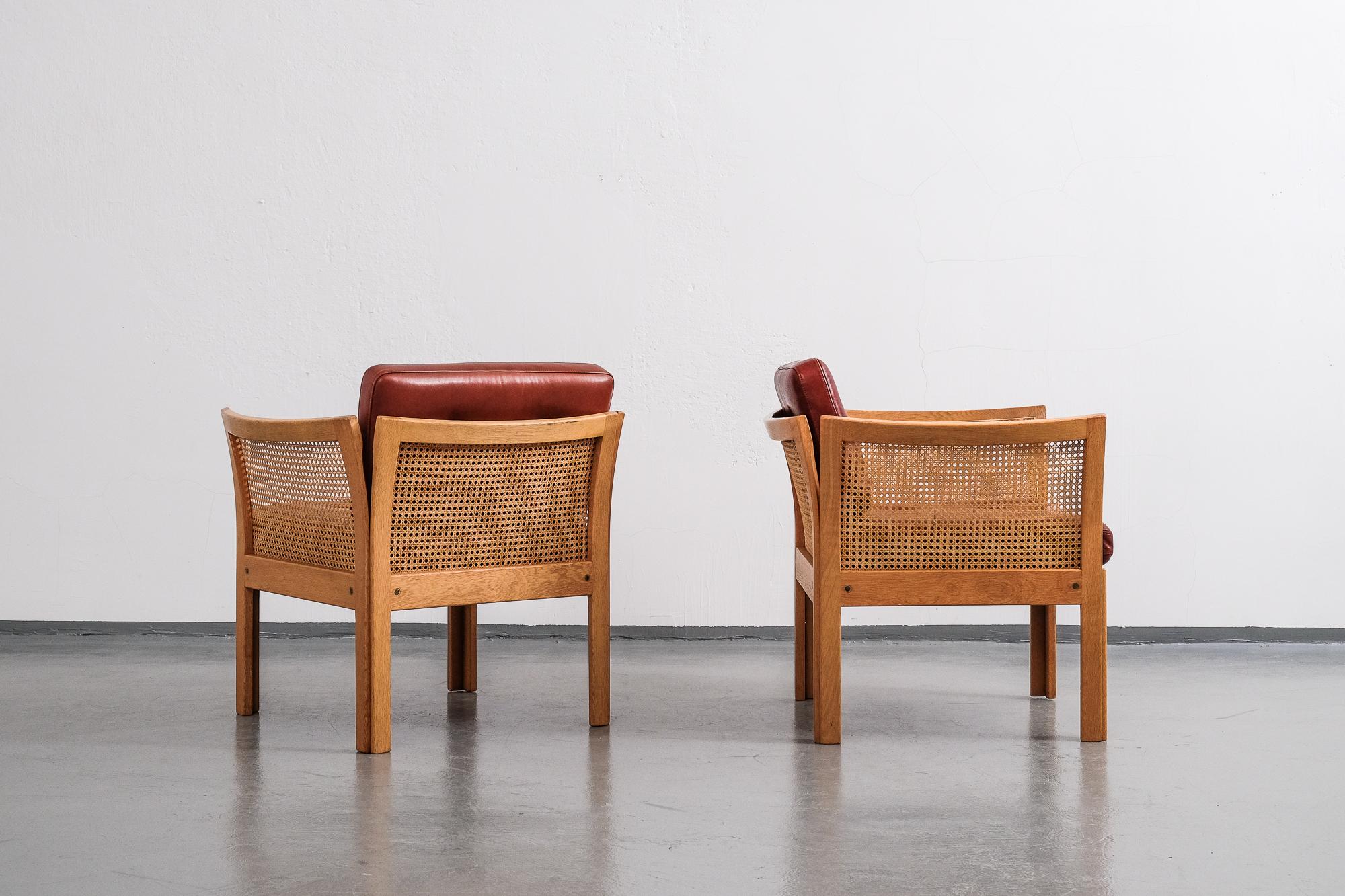 Pair of Illum Wikkelsø 'Plexus' Easy Chairs in Oak and Coqnac Leather, 1960s 1