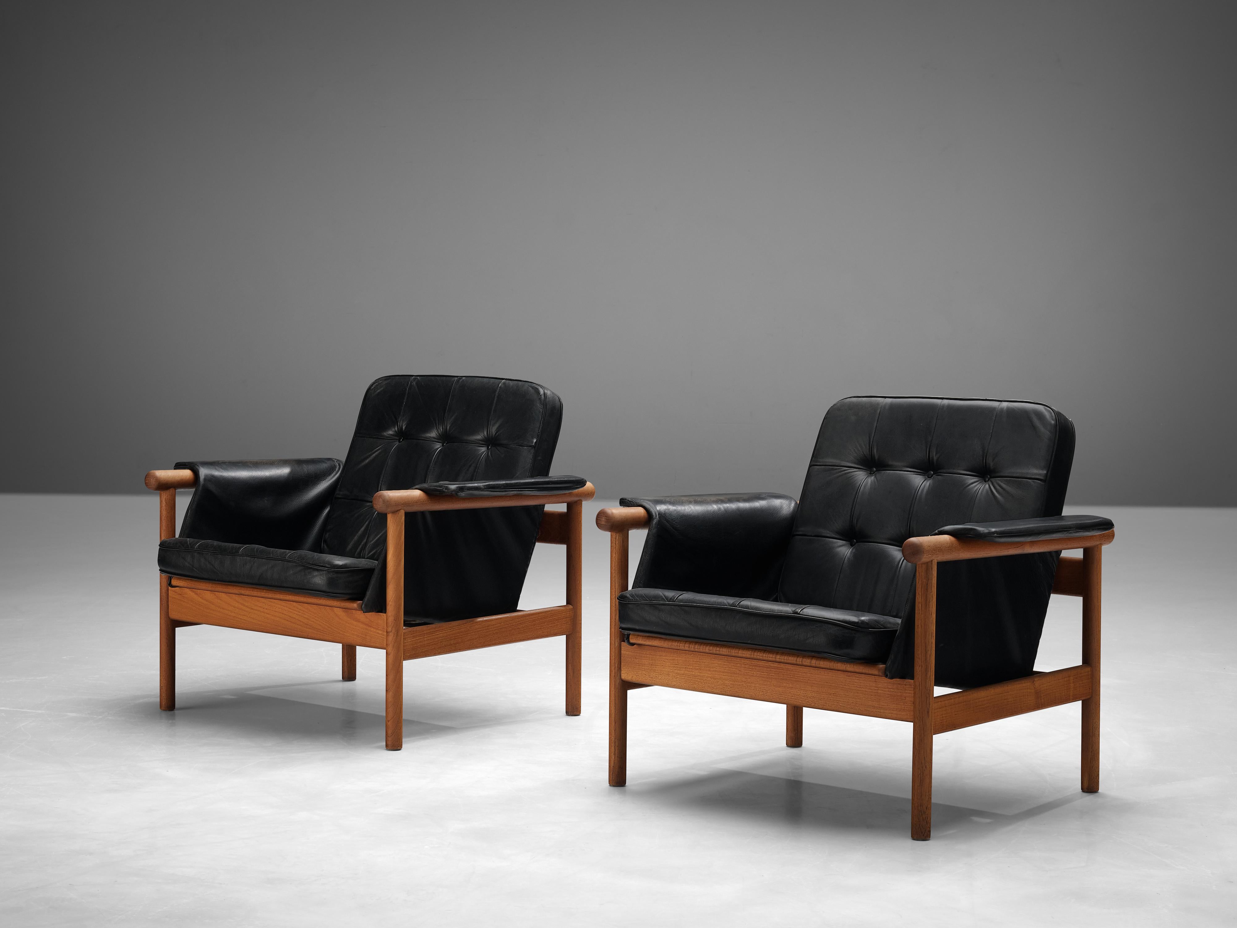 Scandinavian Modern Illum Wikkelsø Pair of 'Wiki' Lounge Chairs in Teak and Black Leather