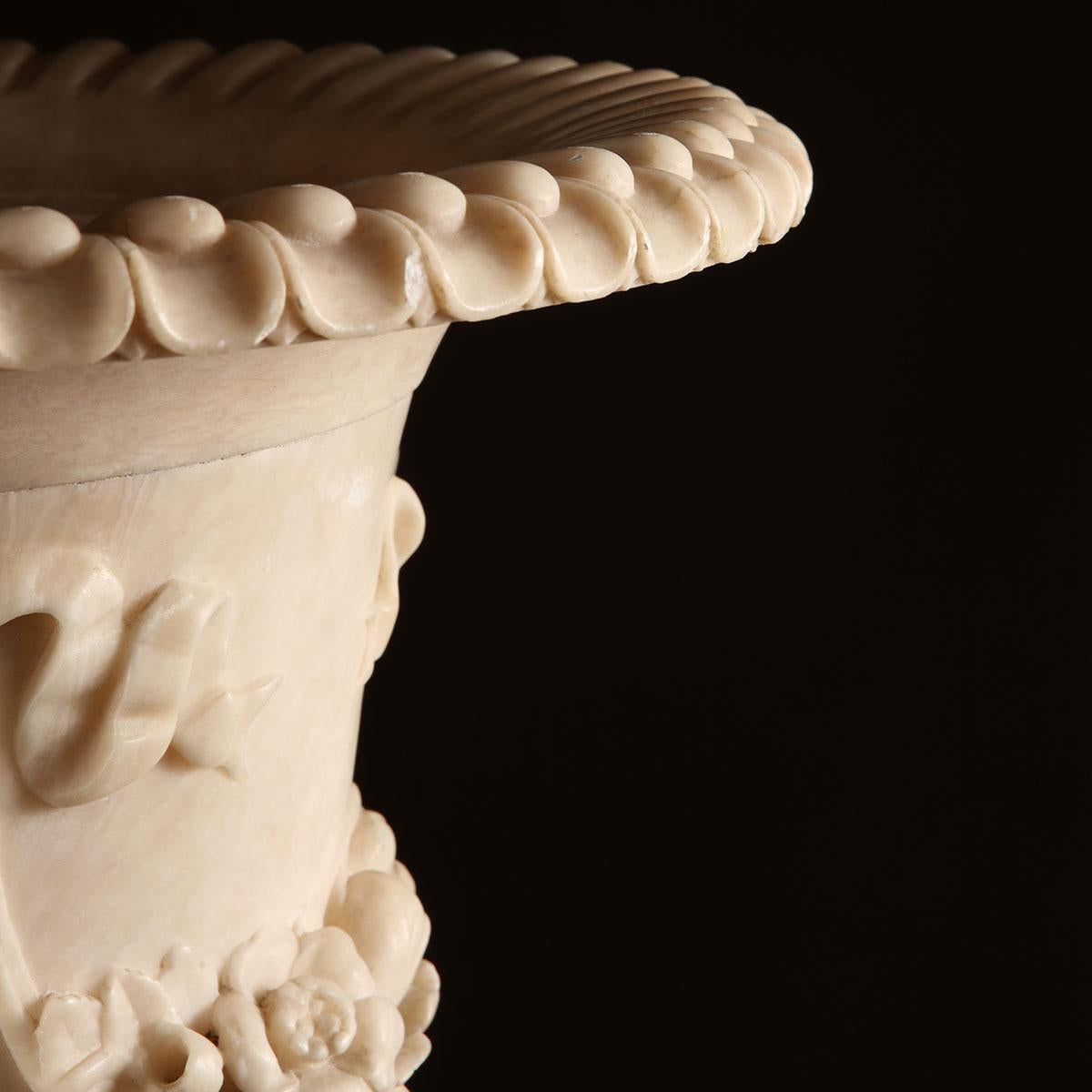 Carved Pair of Illuminating Classical Alabaster Columns and Vases For Sale