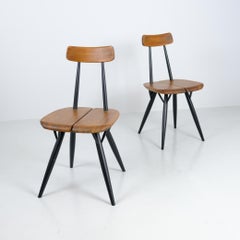 Pair of Ilmari Tapiovaara Pirkka chairs, Laukaan Puu, Finland 1950s