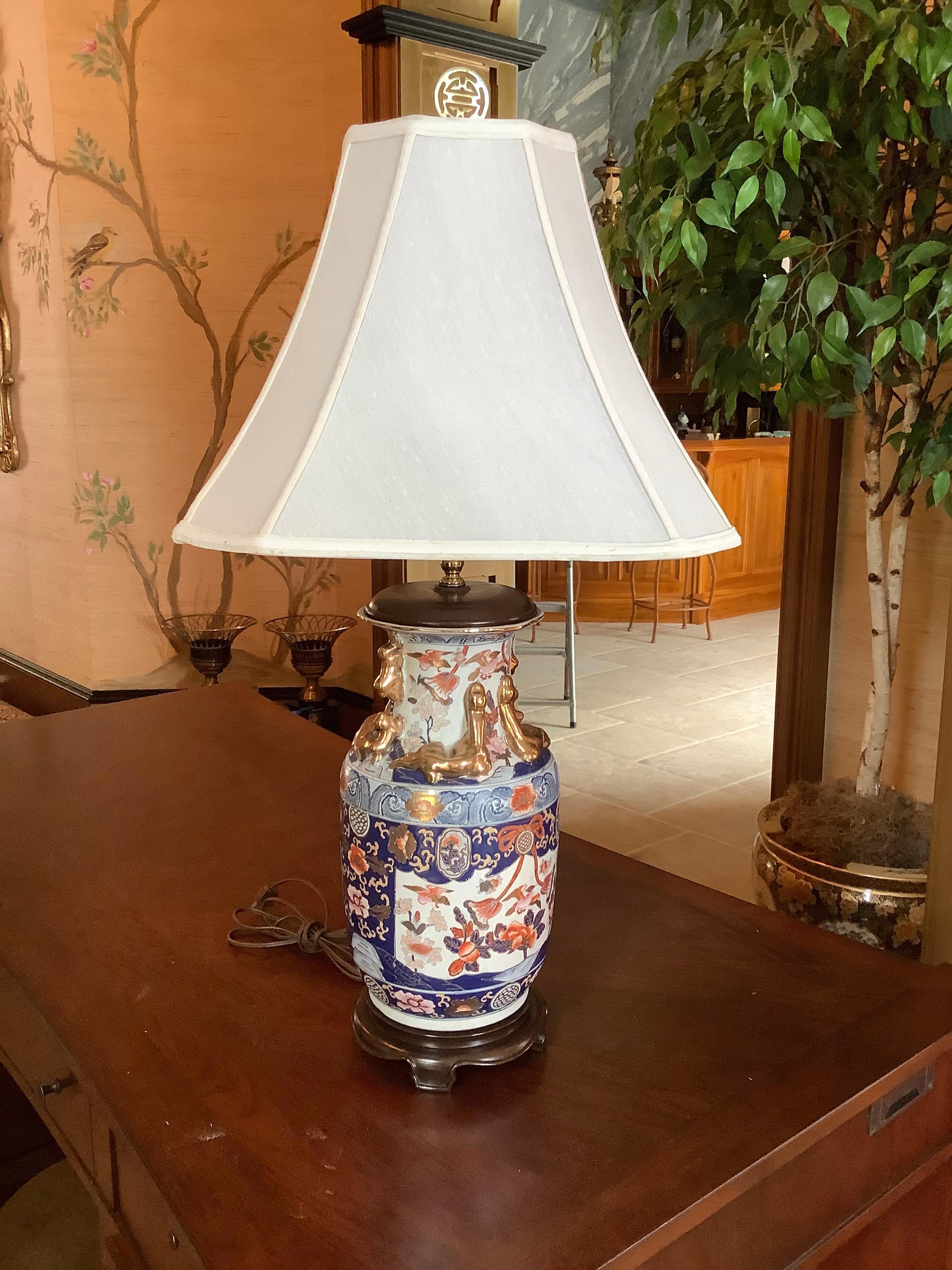 Porcelain Pair of Imari Style Lamps on Wood Bases, 20th Century