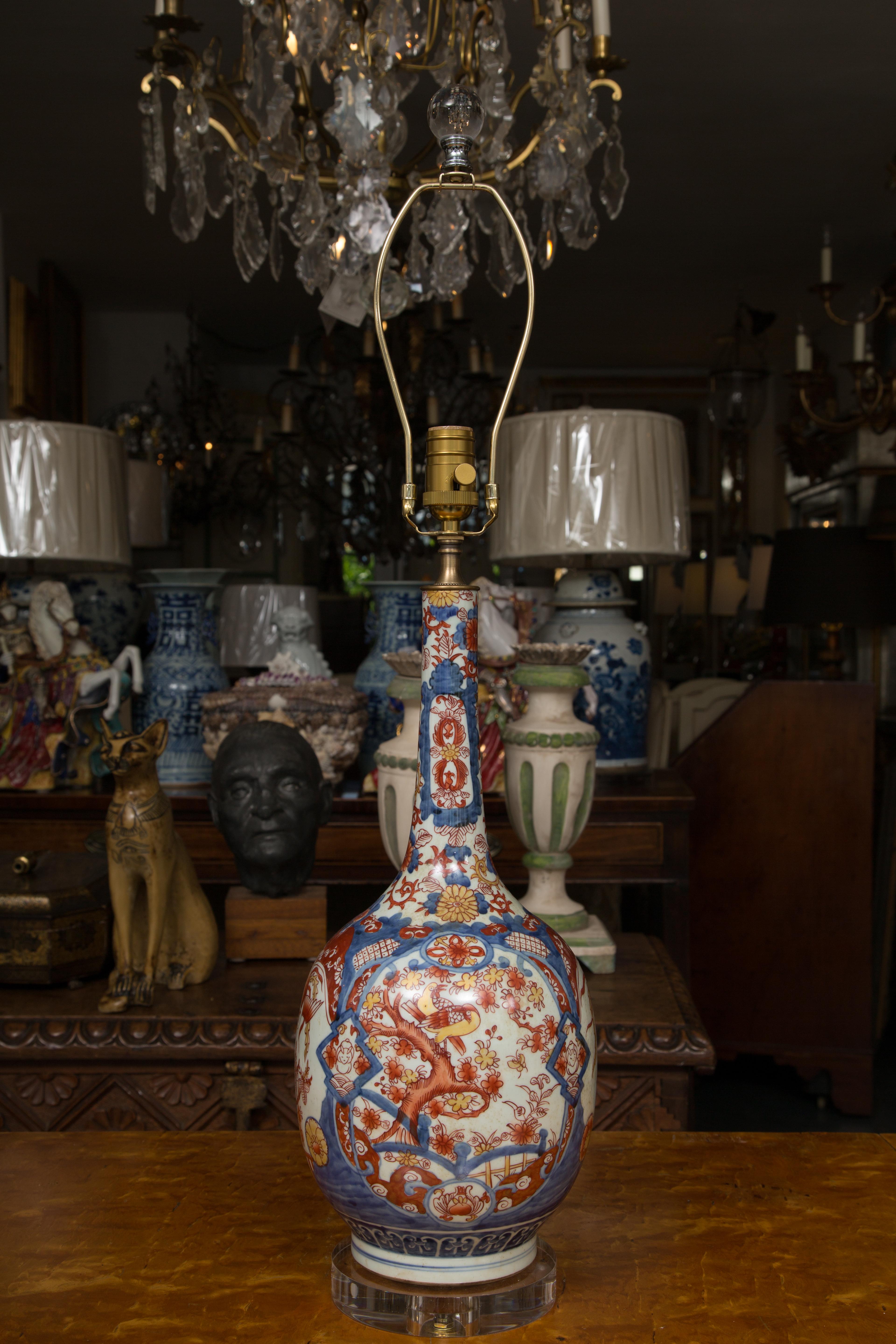 These are reproduction handmade Japanese Classic Imari design gourd shaped lamps. The tall stem on a gourd shape is placed on a plexiglass base. Priced individually.