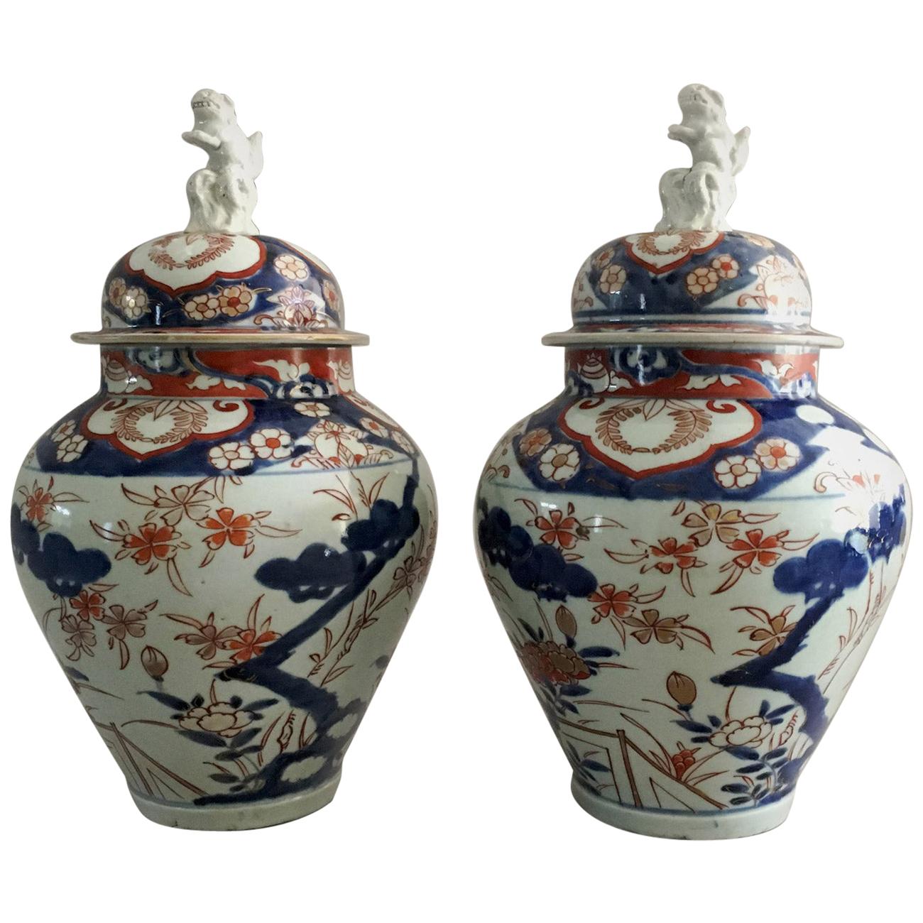 Pair of Imari Vases with Lids and Foo Dog Finials For Sale