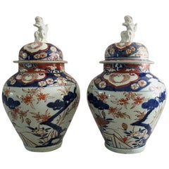 Pair of Imari Vases with Lids and Foo Dog Finials