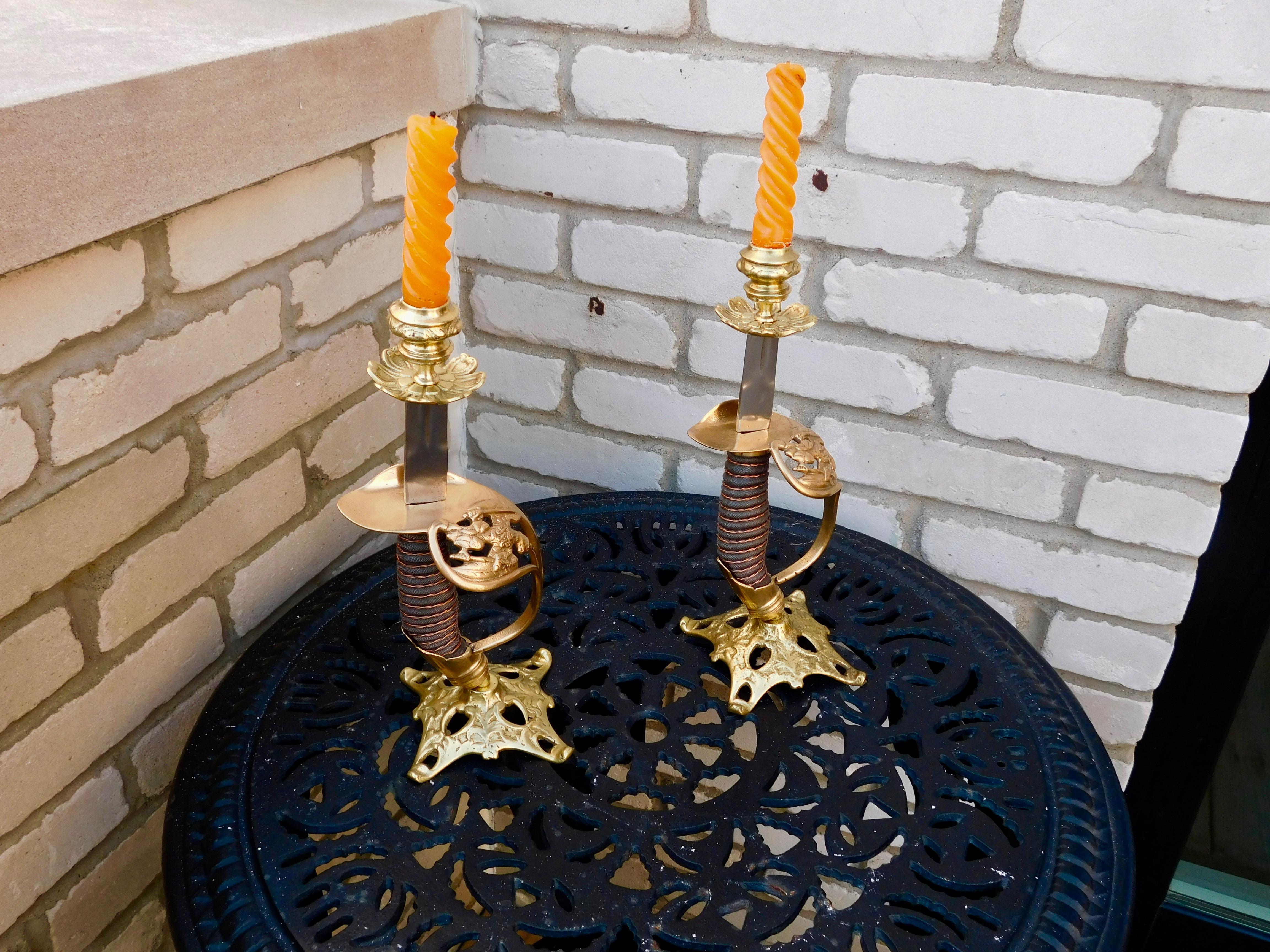 Pair of Antique Candle Holders made from 1889 model Prussian infantry officer's swords. They would of been made from unused swords, the manufacturer would create these candlesticks to give as gifts to stores as incentives to get favor to carry their