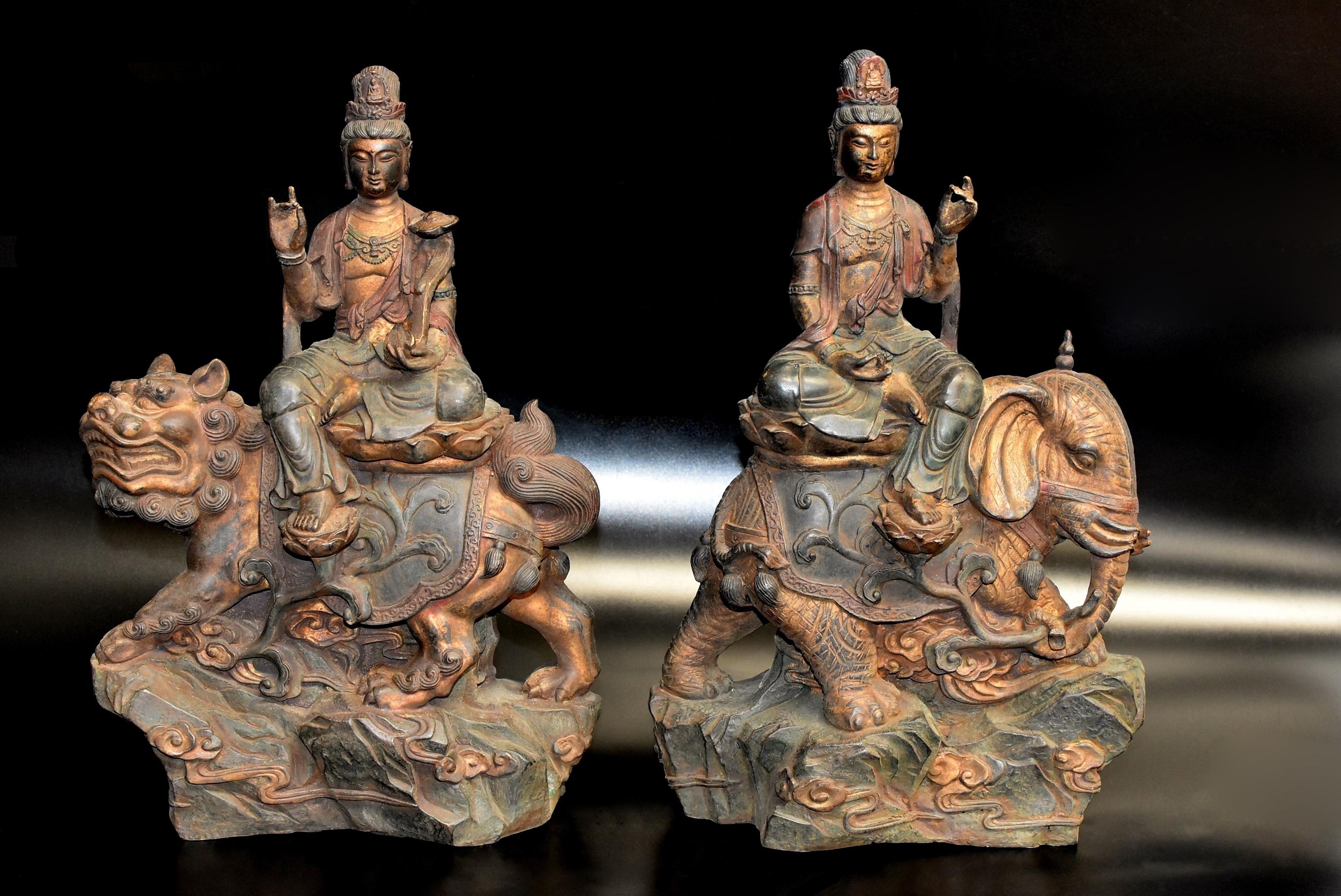 A pair of beautiful bronze statues of Avalokiteshvara. The Bodhisattvas are seated in lalitasana, the 
