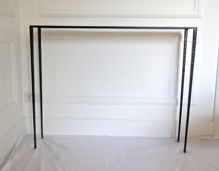 Pair of important black bronze console tables named 