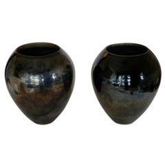 Pair of Important Black Ceramic Vases