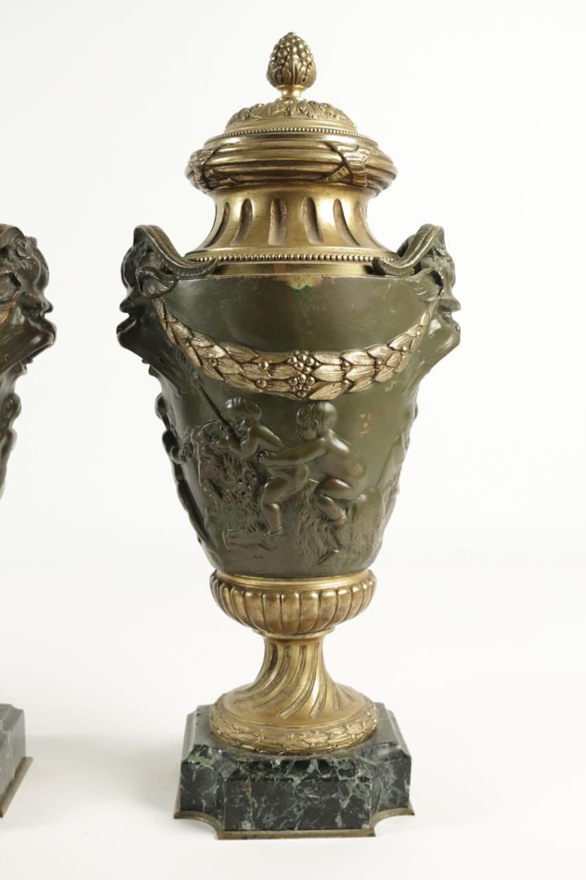 Pair of important Cassolettes Napoleon III, gilt bronze and patinated, marble base, 19th century. Measures: H 41cm, W 17cm, W 12cm.