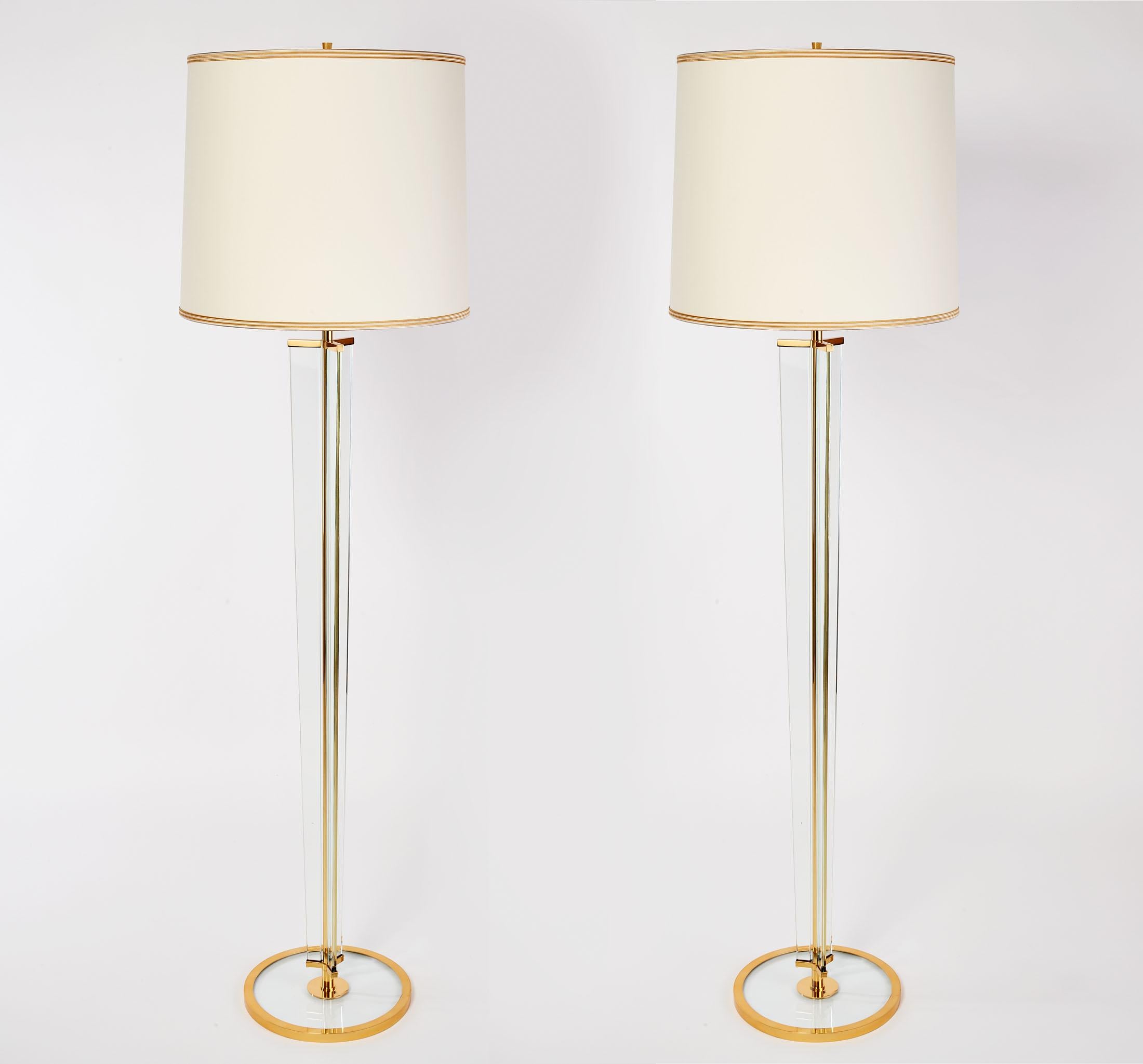 ITALY, ca. 1950
Magnificent pair of tall tripartite clear glass floor lamps with polished brass mounts attributed to Fontana Arte
75 H x 21 Diameter at Shade, 14 Diameter at Base
Shown as a pair, priced and sold individually
Rewired for use in the