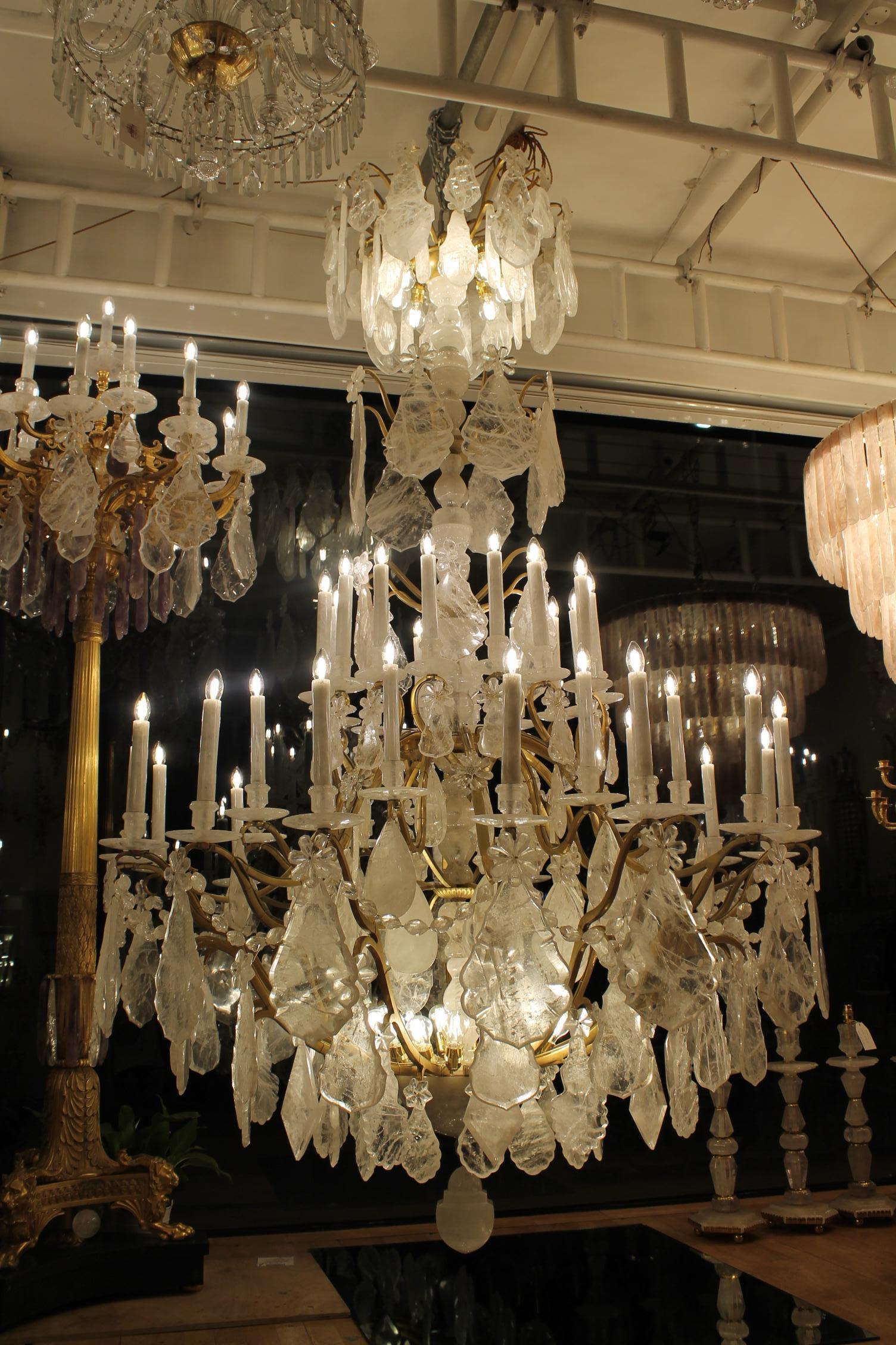 20th Century Pair of imposing rock crystal Louis XV style cage chandeliers For Sale