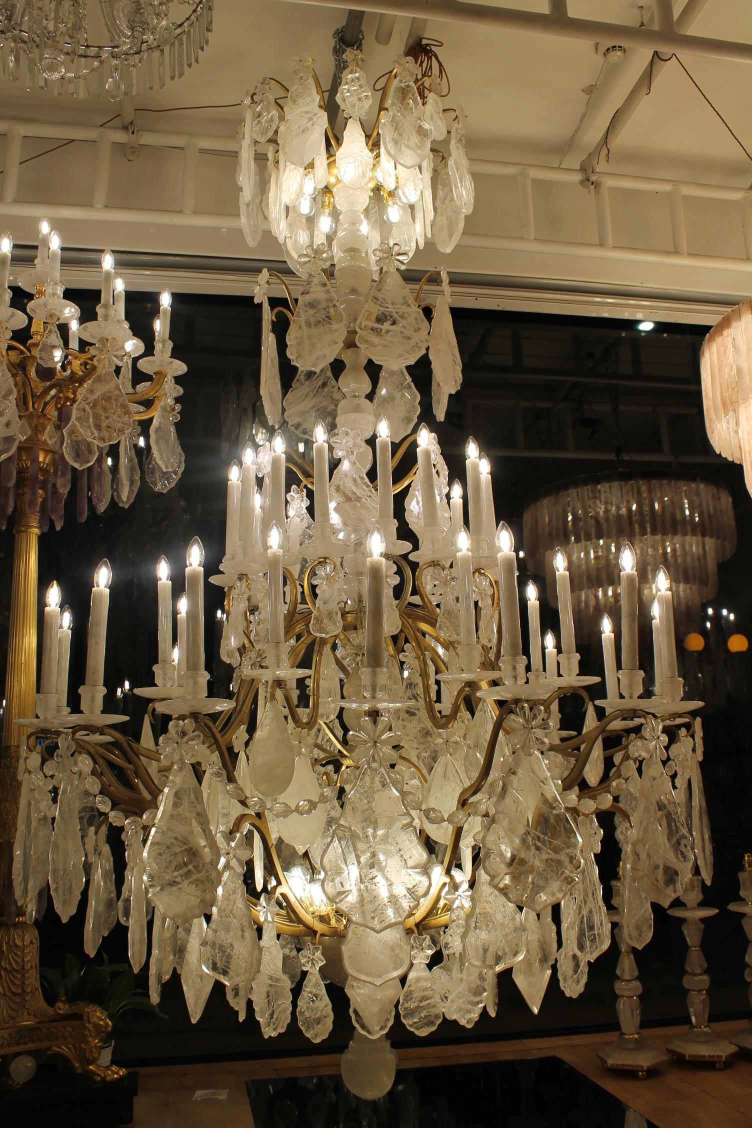 Bronze Pair of imposing rock crystal Louis XV style cage chandeliers For Sale