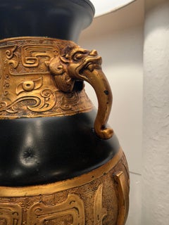 Pair of Impressive Black and Gold Table Lamps in the Manner of James Mont