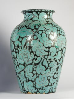 Pair of impressive blue and black vases with floral pattern