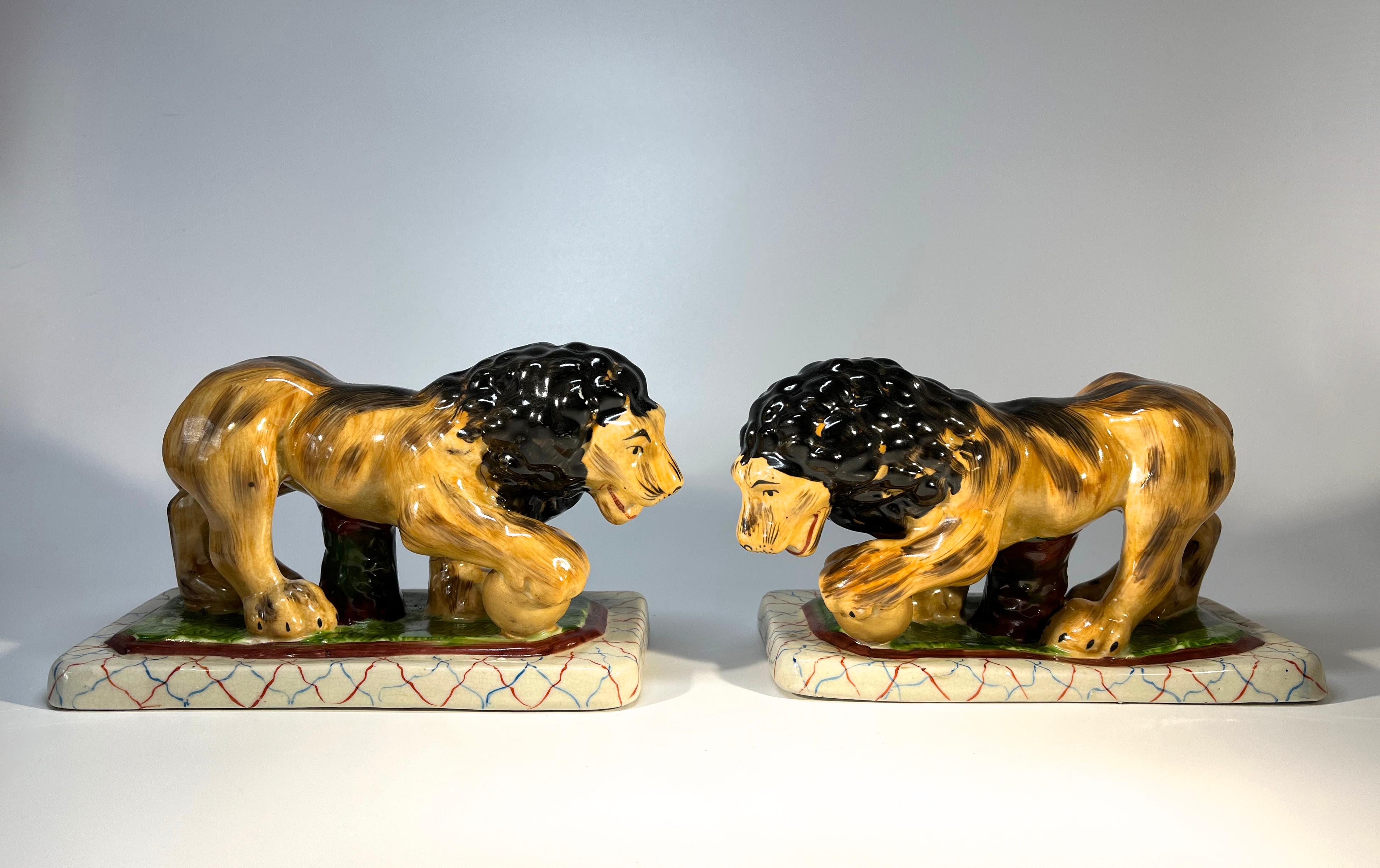 An impressive pair of Medici Lions fashioned after the style of Staffordshire Pottery of the late 1800's
Capable of making a splendid decorative statement
Circa 1960's
Height 4.75 inch, Width 8 inch, Depth 4 inch
In very good condition
Wear
