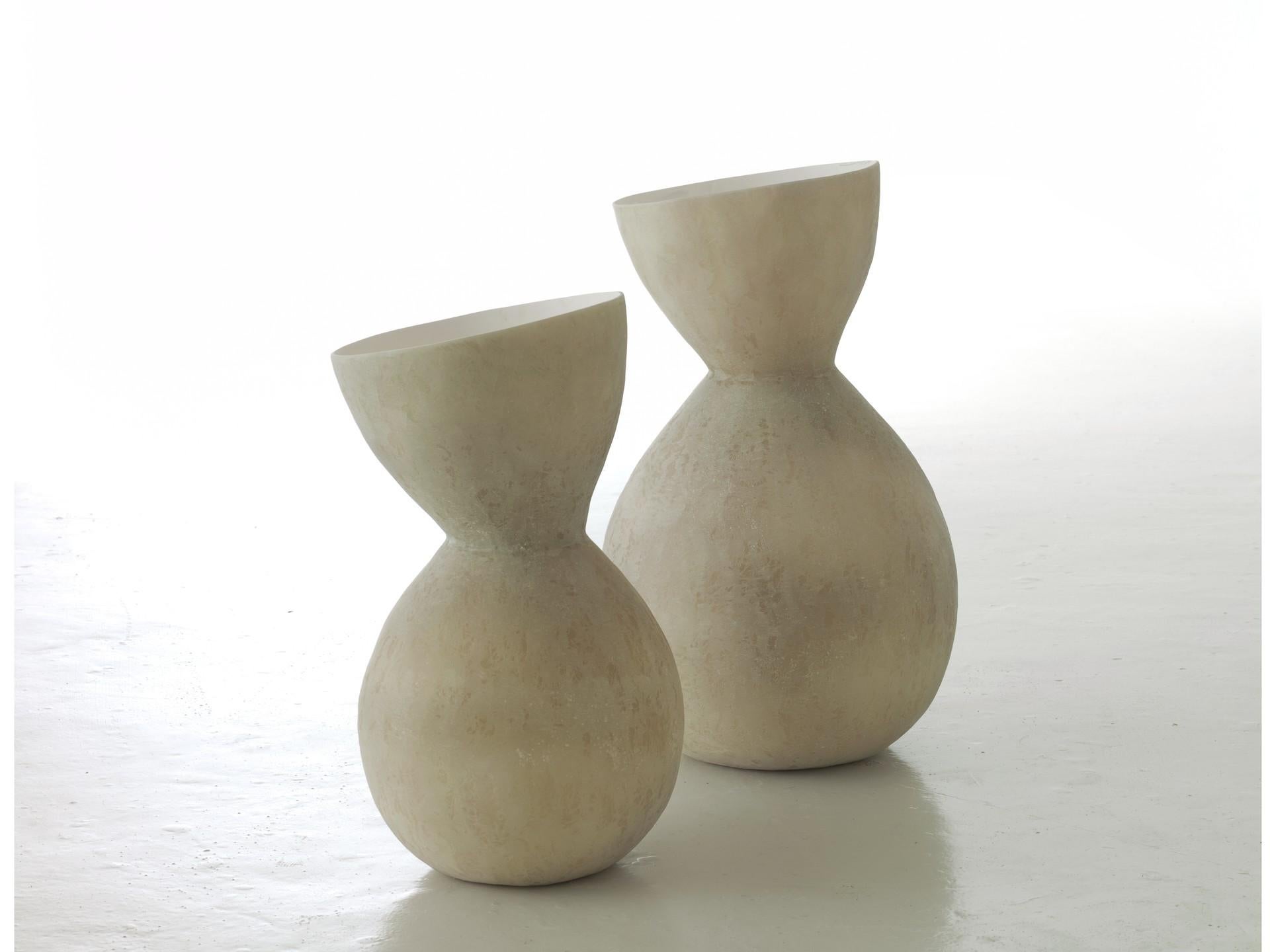 Pair of Incline vases by Imperfettolab
Dimensions: 
Ø 38 x H 67 cm
Ø 30 x H 55 cm
Materials: Raw material.


Imperfetto Lab
Who we are ? We are a family.
Verter Turroni, Emanuela Ravelli and our children Elia, Margherita and Eusebio.
All