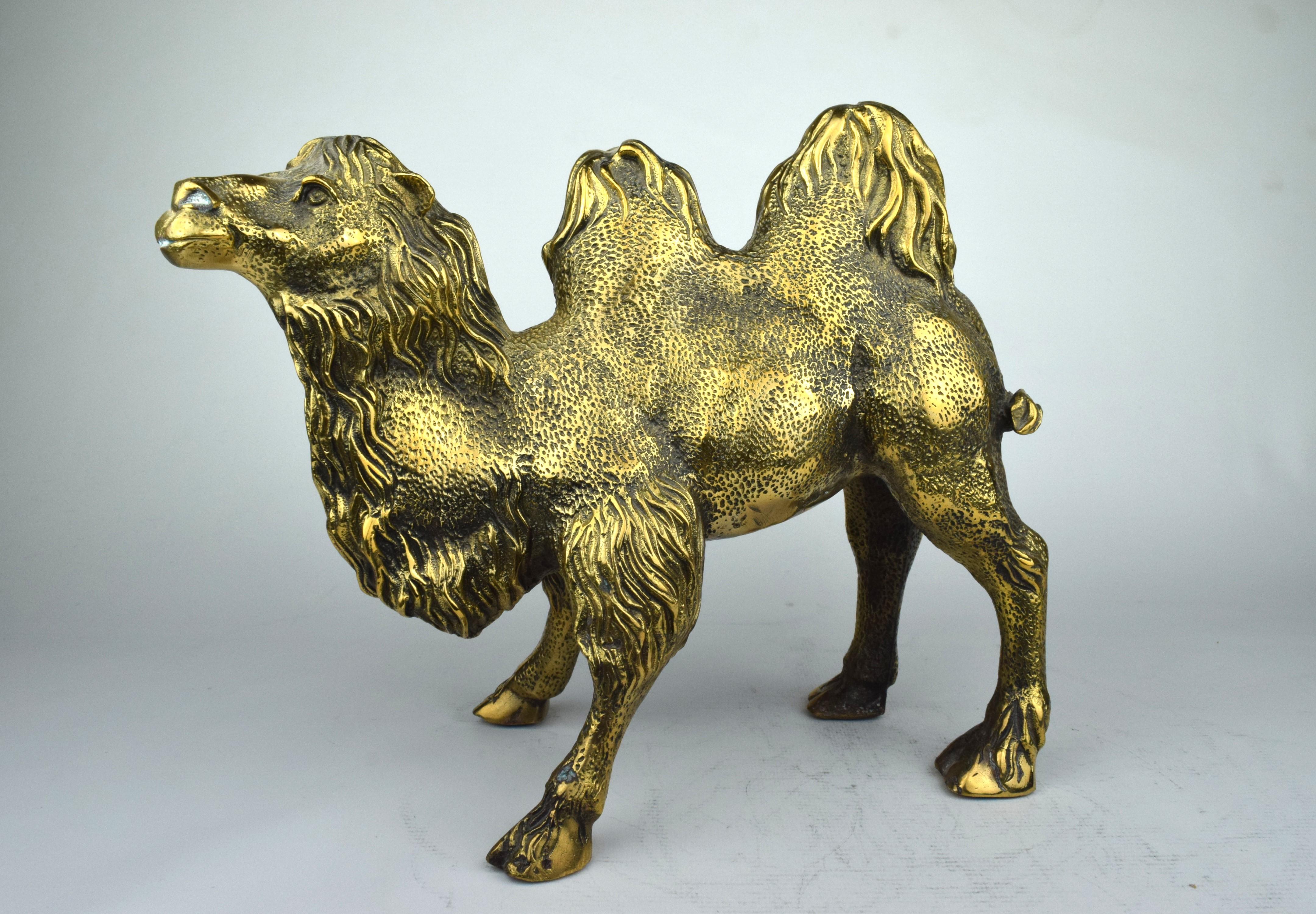 The pair of Indian brass engraved camel sculptures is an exquisite examples of traditional Indian metalwork, combining skilled craftsmanship with artistic detailing. These sculptures, made of brass for its durability and versatility, showcase the