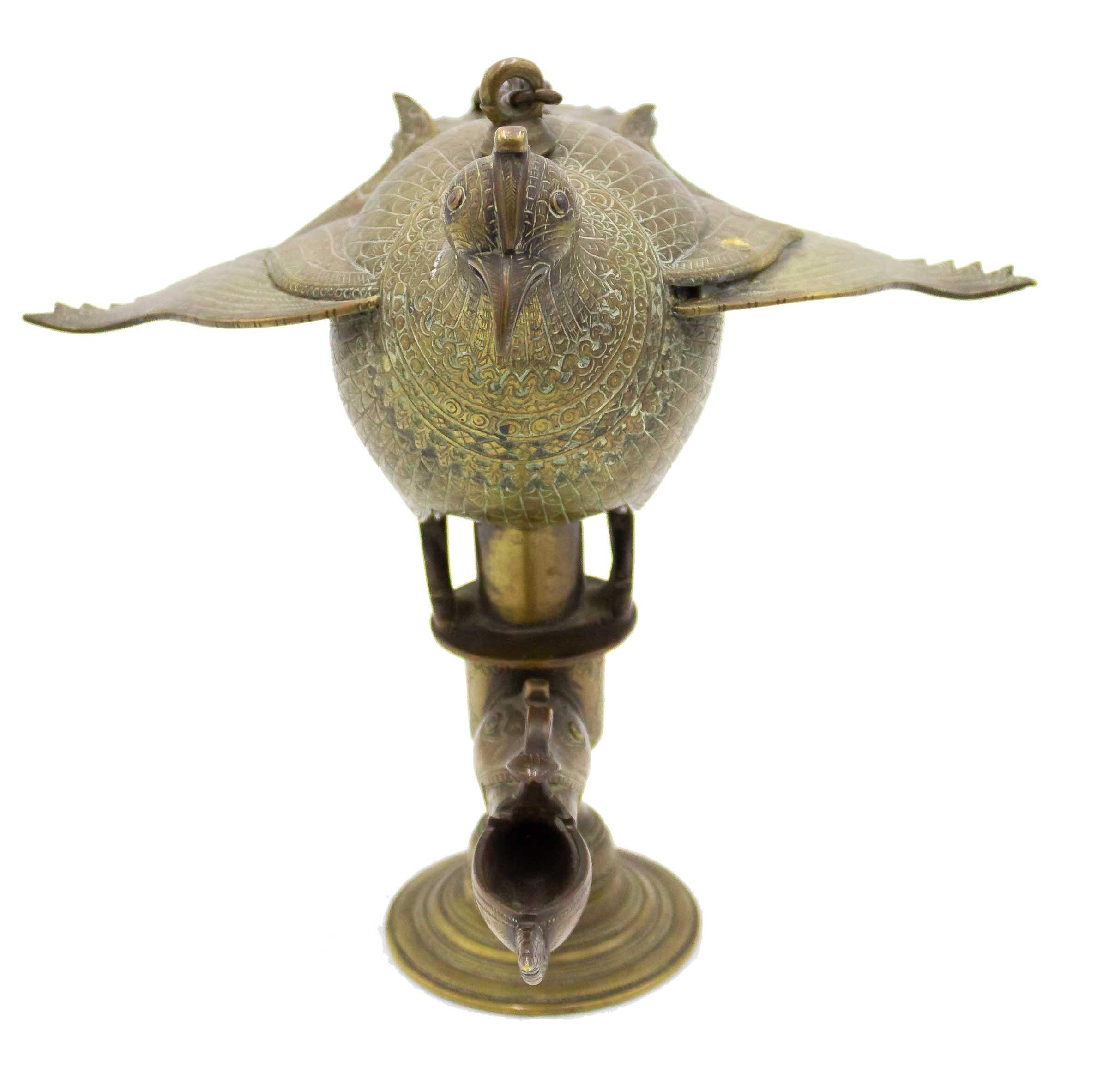 hanging oil lamp with statue