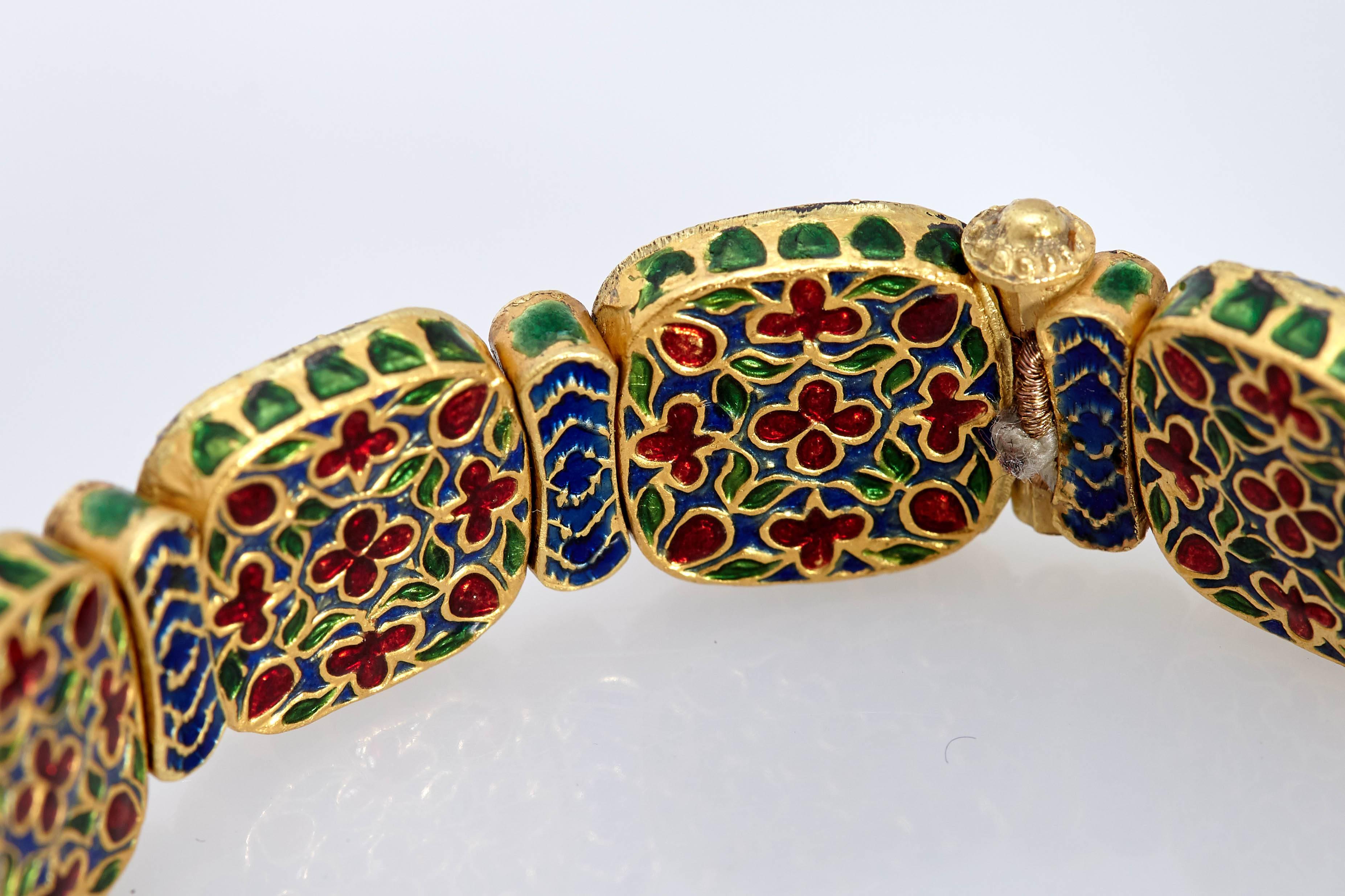 A pair of 22 kt gold, enamel, rose cut diamonds, and multicolor stones Indian 