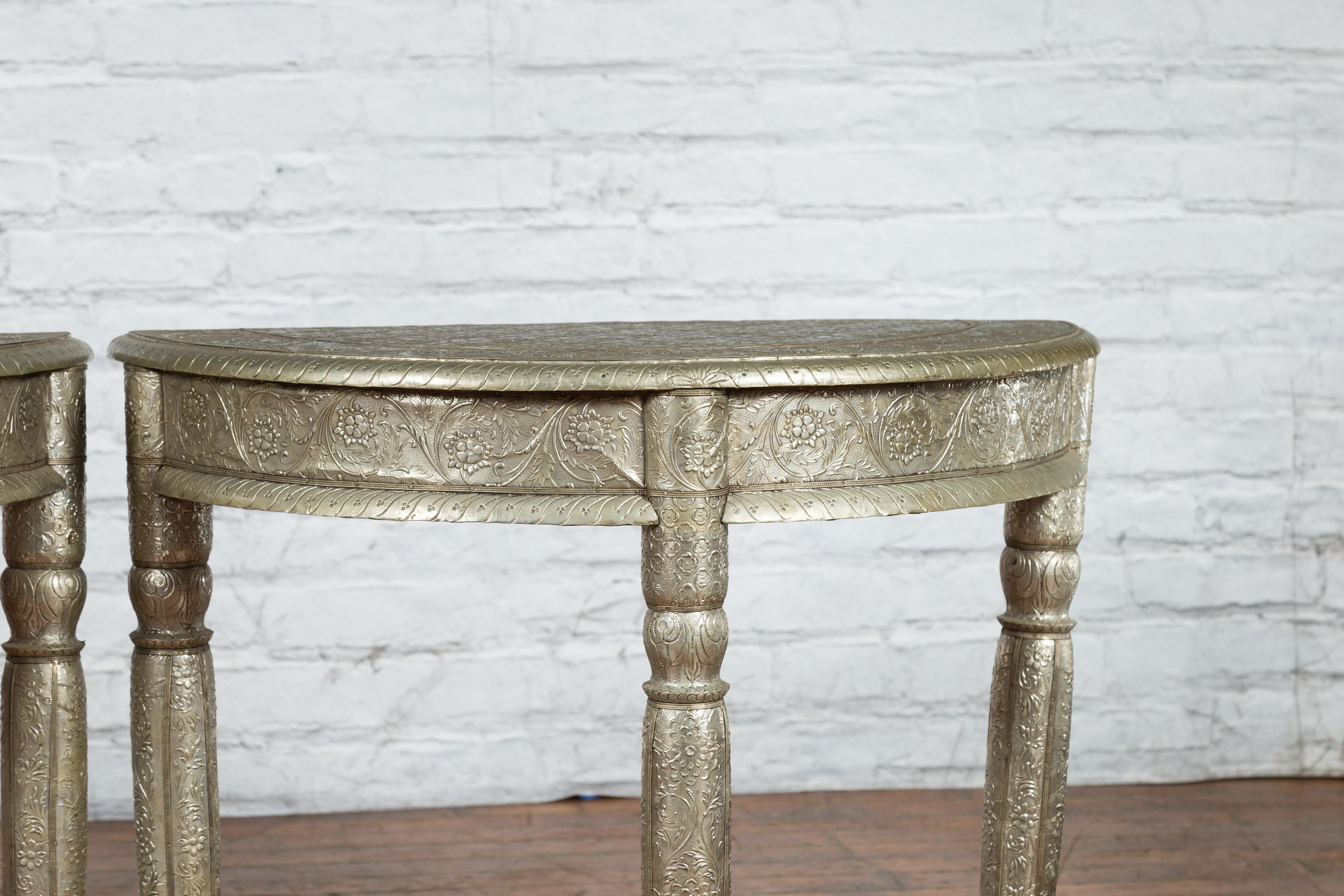 Pair of Indian Metal Sheathing Repoussé Demilune Tables with Floral Arabesques In Good Condition For Sale In Yonkers, NY