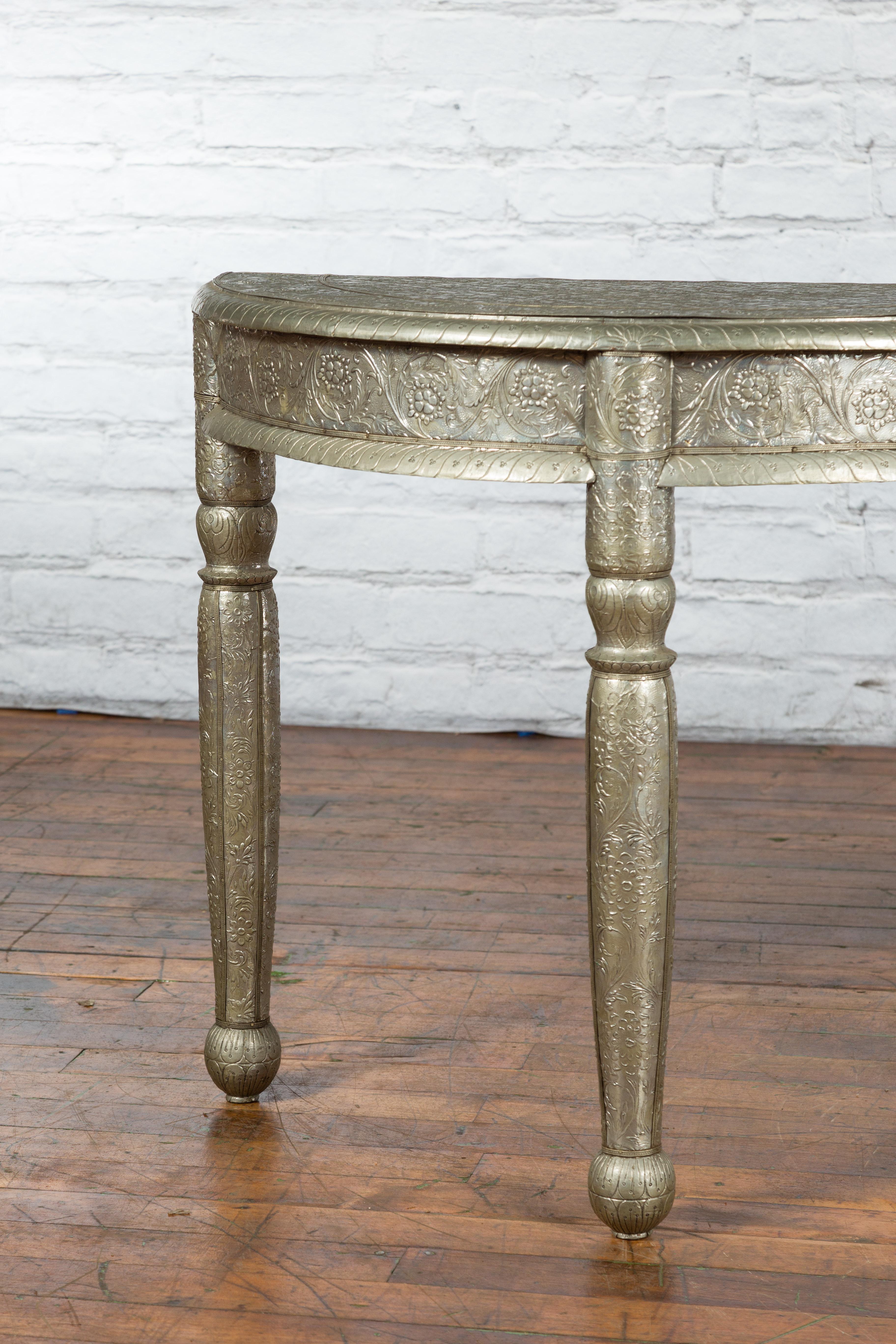 19th Century Pair of Indian Metal Sheathing Repoussé Demilune Tables with Floral Arabesques For Sale