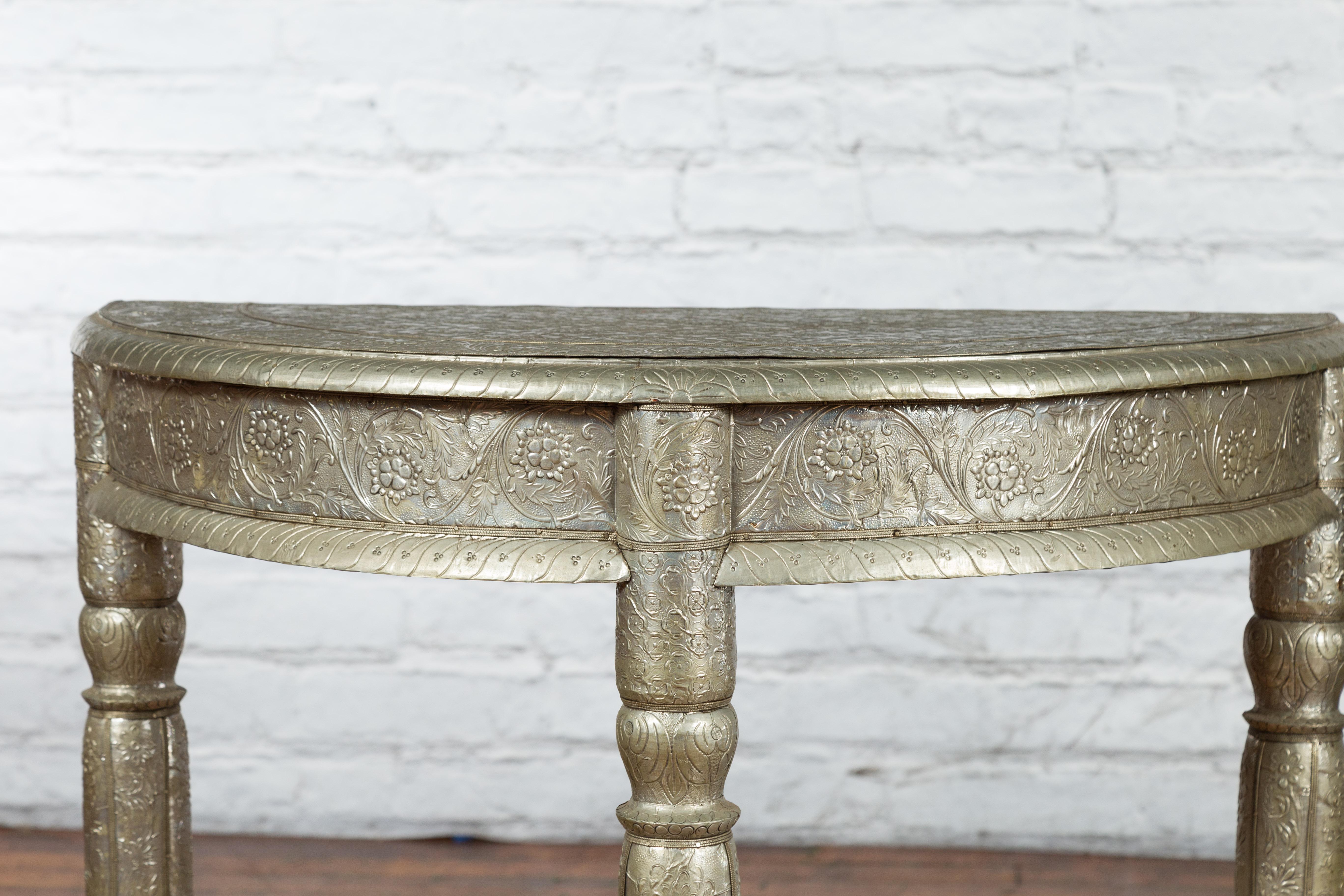 Pair of Indian Metal Sheathing Repoussé Demilune Tables with Floral Arabesques For Sale 1