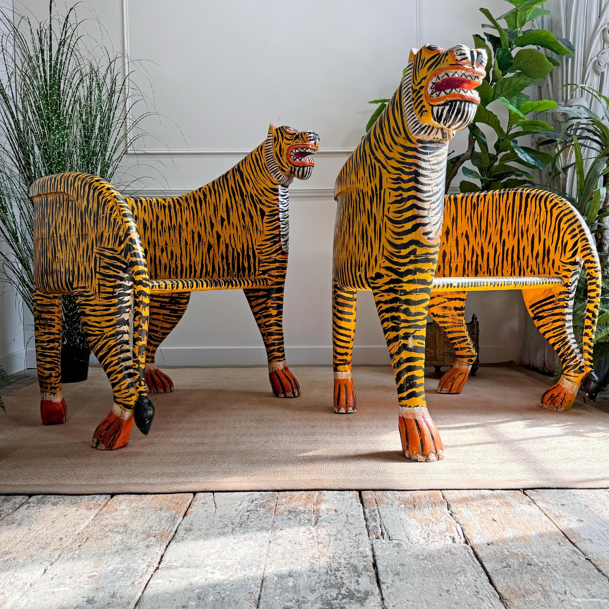 An incredible pair of Indian polychrome-decorated 'Tiger' throne chairs, also known as Maharaja Chairs, hand crafted and hand painted.

Second half 20th century



Price displayed is for the Pair of chairs.



Height 98 cm x Width 83 cm x Depth 77