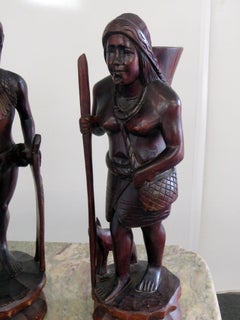 Pair of Carved Wood 2ft Tall Male and female Native American Indian Sculptures