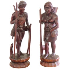 Pair of Carved Wood 2ft Tall Male and female Native American Indian Sculptures