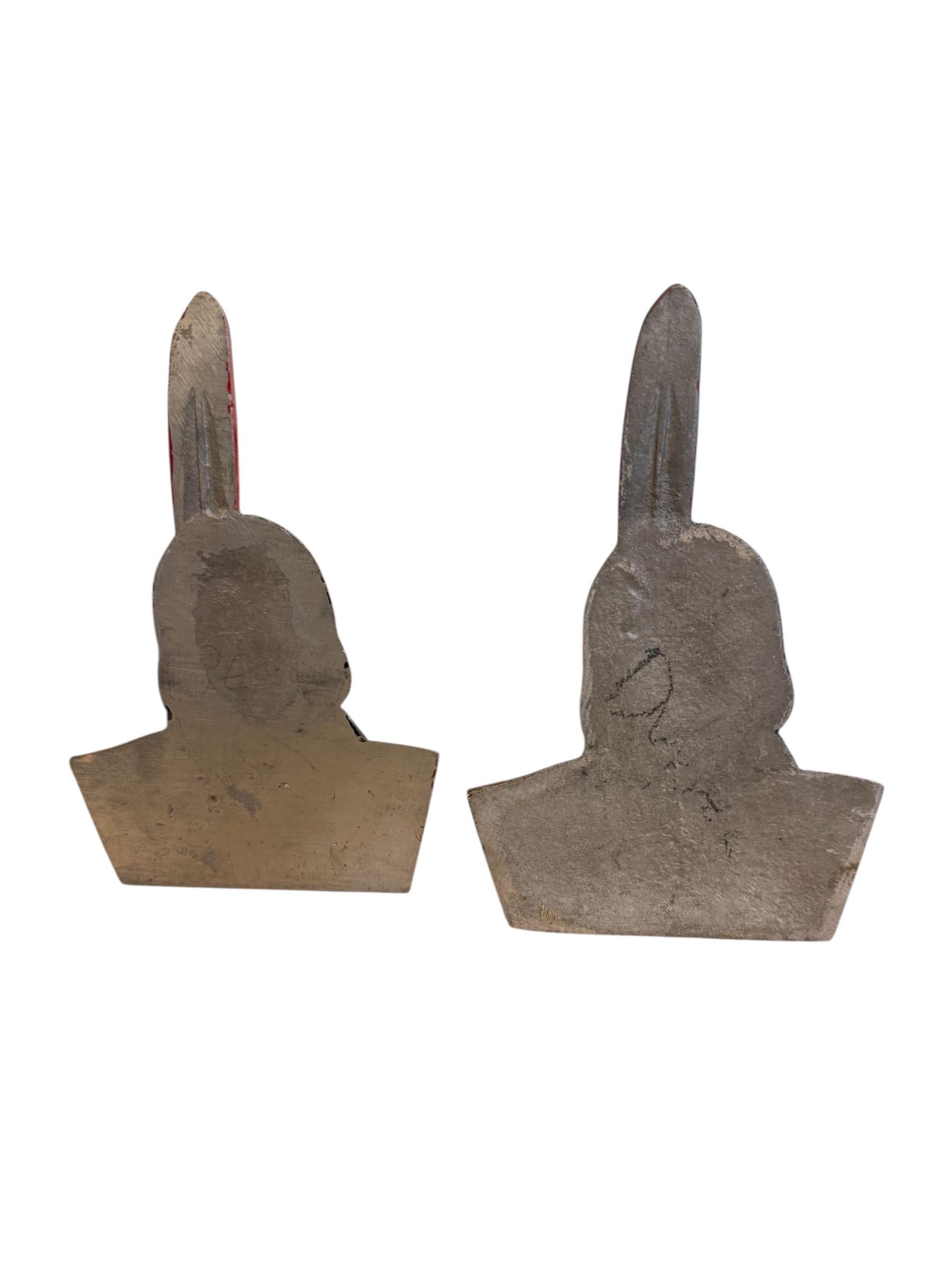 Honor a piece of American banking and cultural history with this striking pair of vintage cast iron bookends, originally produced for the Shawmut Bank. W5 x D1.5 x H8