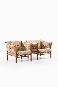 Pair of Indra Easy Chairs in Beech, Brass & Leather by Arne Norell, 1970s