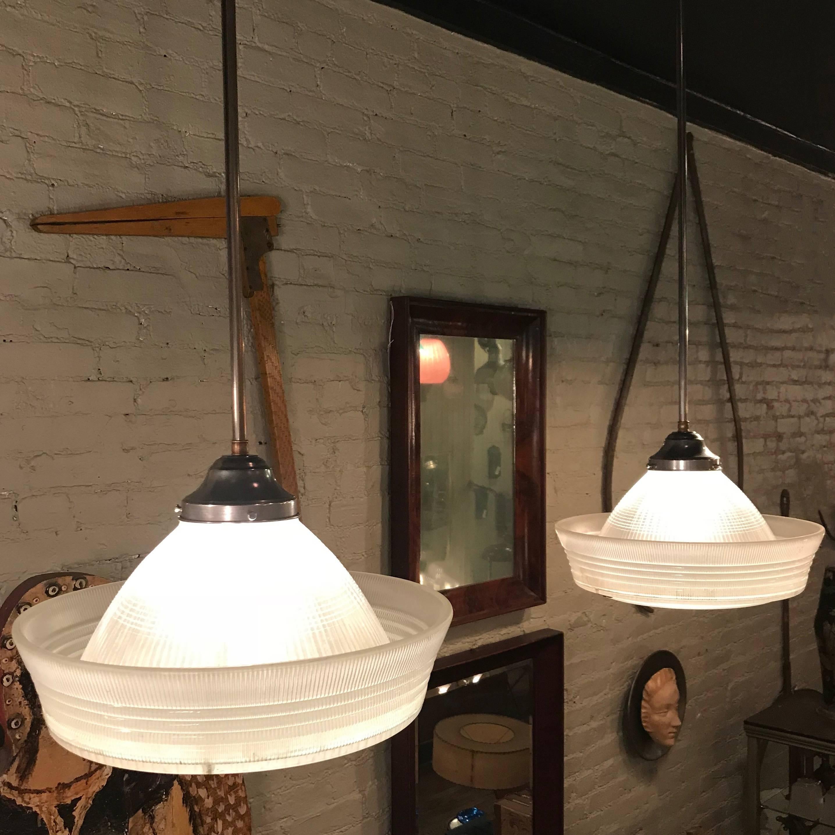 Mid-20th Century Pair of Industrial Brimmed Dome Prismatic Holophane Pendant Lights