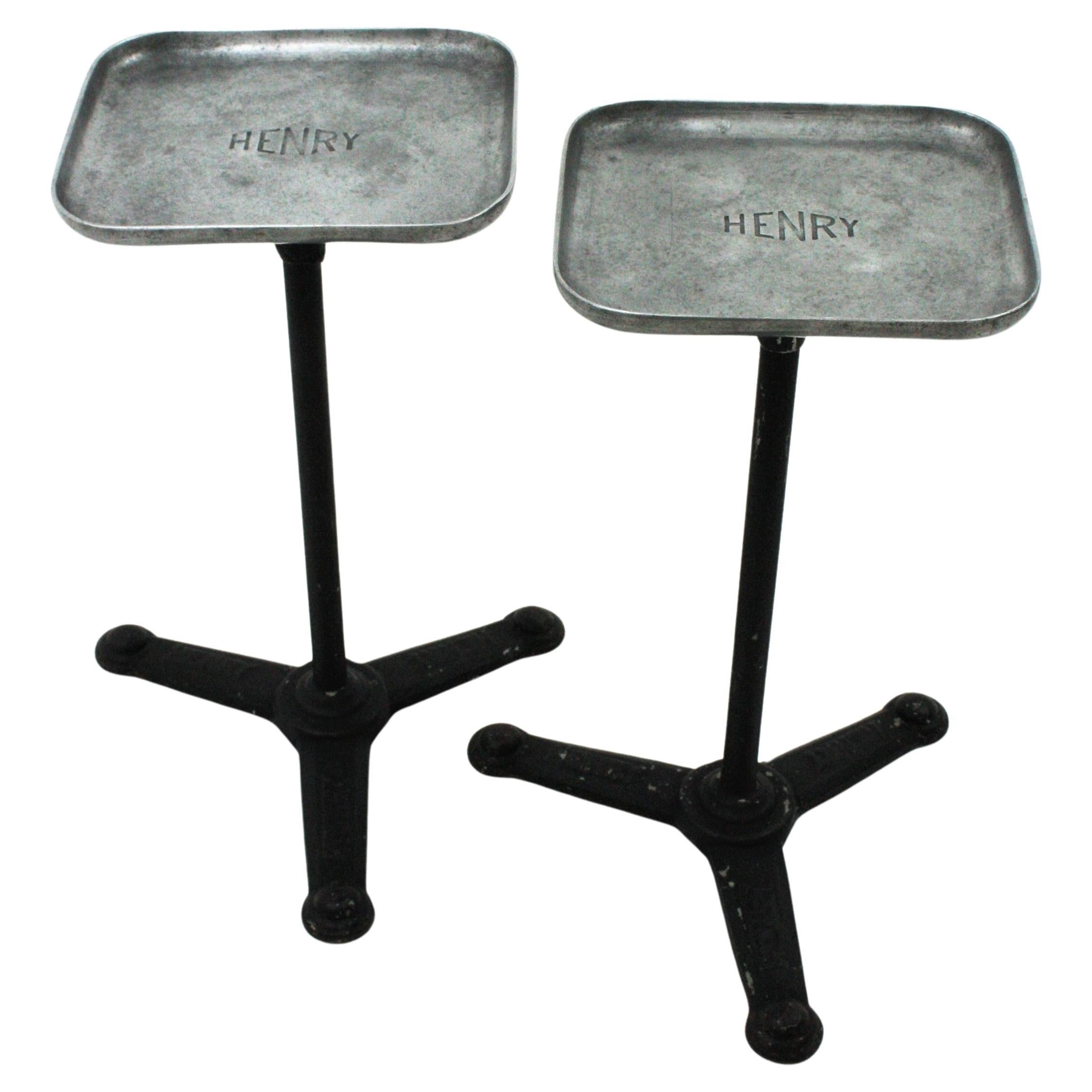 Pair of aluminium and iron spanish drinks tables, 1960s
Rectangular aluminium tops with black painted iron tripod bases.
Originally used as hairdresser work stand tripod tables by Henry Colomer beauty salon and hairdressing supplier.
These