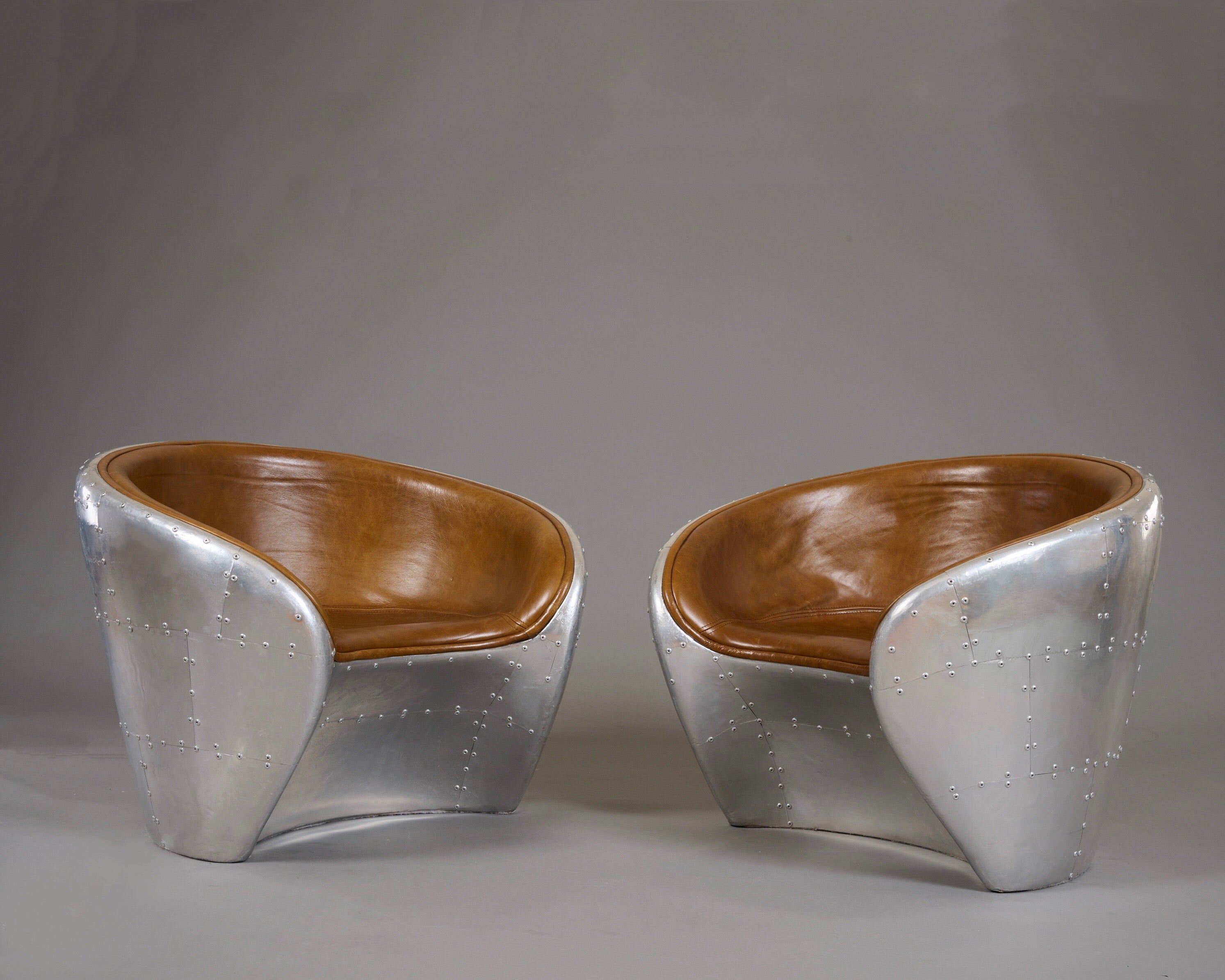 Pair of Industrial Egg Chairs in Aluminum and Leather, France 1970
s For Sale