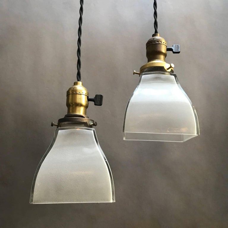 American Pair of Industrial Frosted Glass and Brass Pendant Lights For Sale