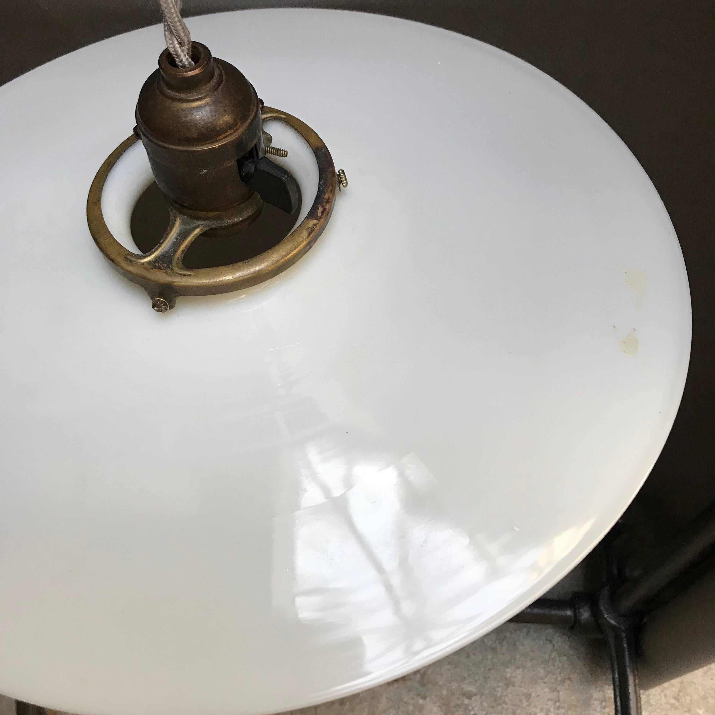 Brass Pair of Industrial Milk Glass Disc Pendant Lights