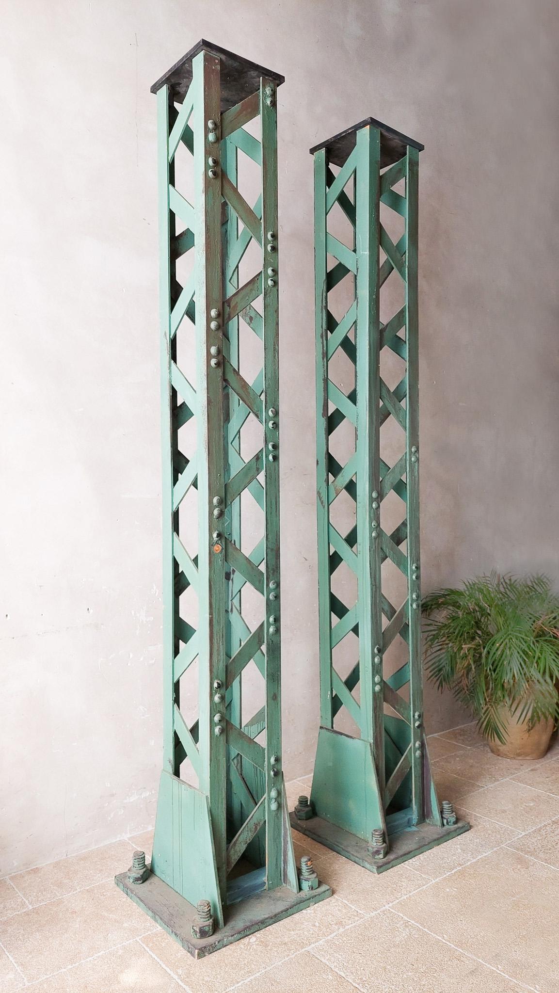 Pair of movie props made of MDF, green patinated metal look. Riveted Columns / Bridge Pilars.

Very decorative!

Not heavy!

Measures: height: 303 cm
foot: 59 x 59 cm.