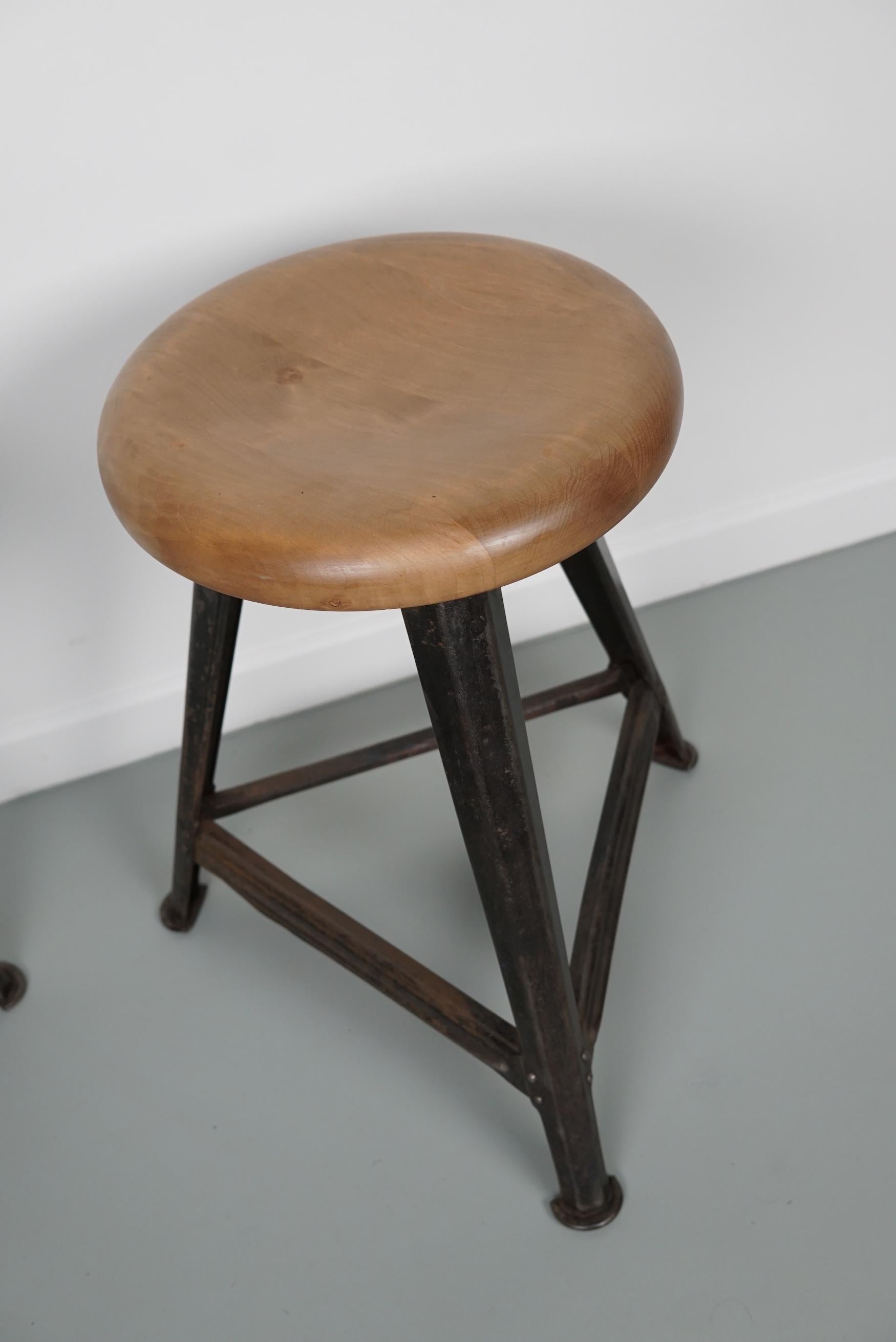 This pair of stools were designed by Robert Wagner and made by Rowac in the 1930s. They feature a steel frame, a wooden seat and Rowac stamp with number 37 underneath the seat. They remain in a good and stable condition with signs of age and use in