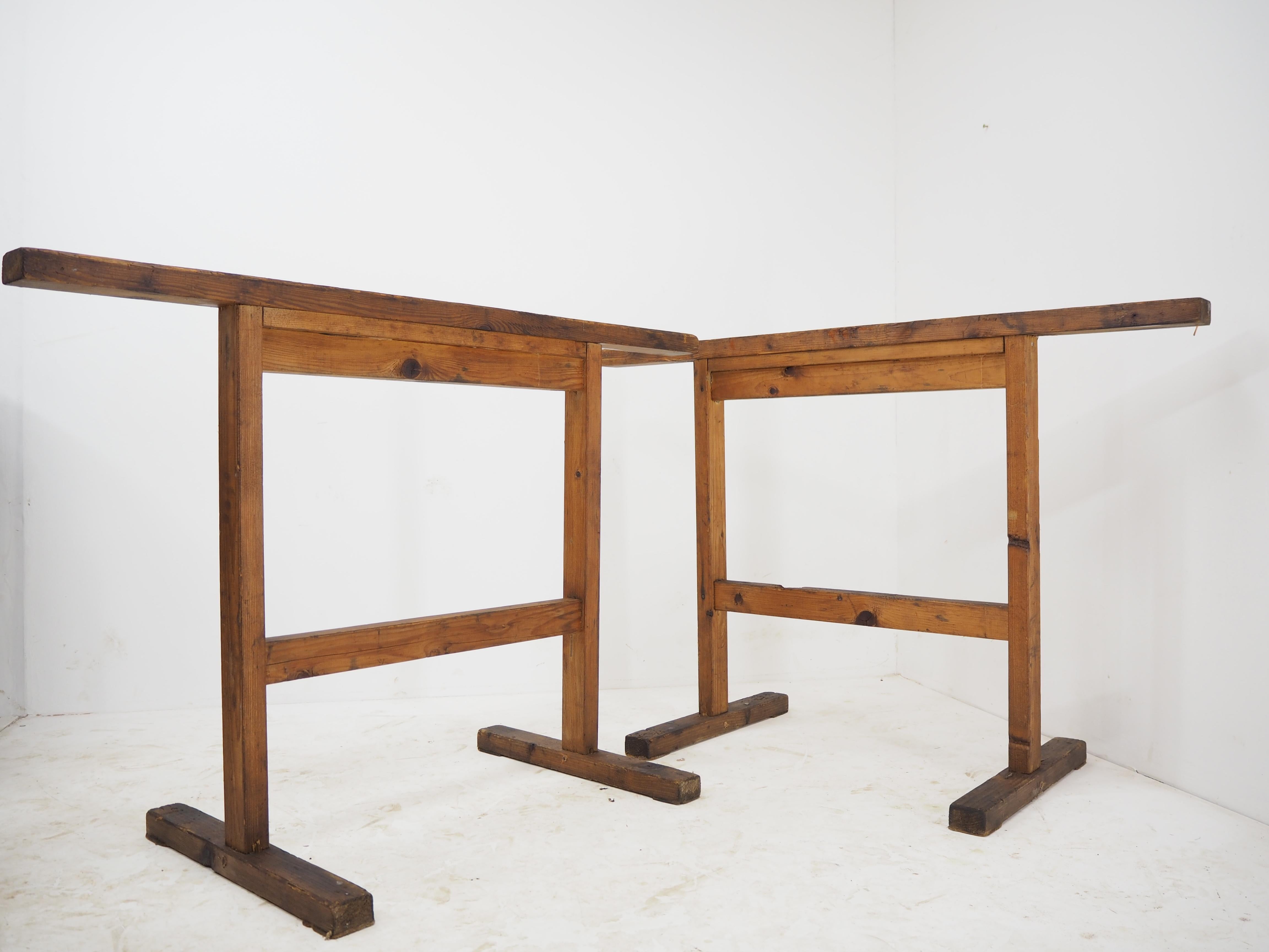 Pair of wooden trestles with original patina
Czechoslovakia 
Cleaned and sealed with a special oil.
In original condition.