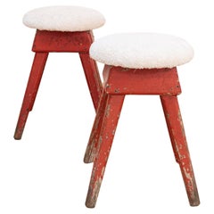Pair of industrial red wooden stool with new wool off-white upholstery