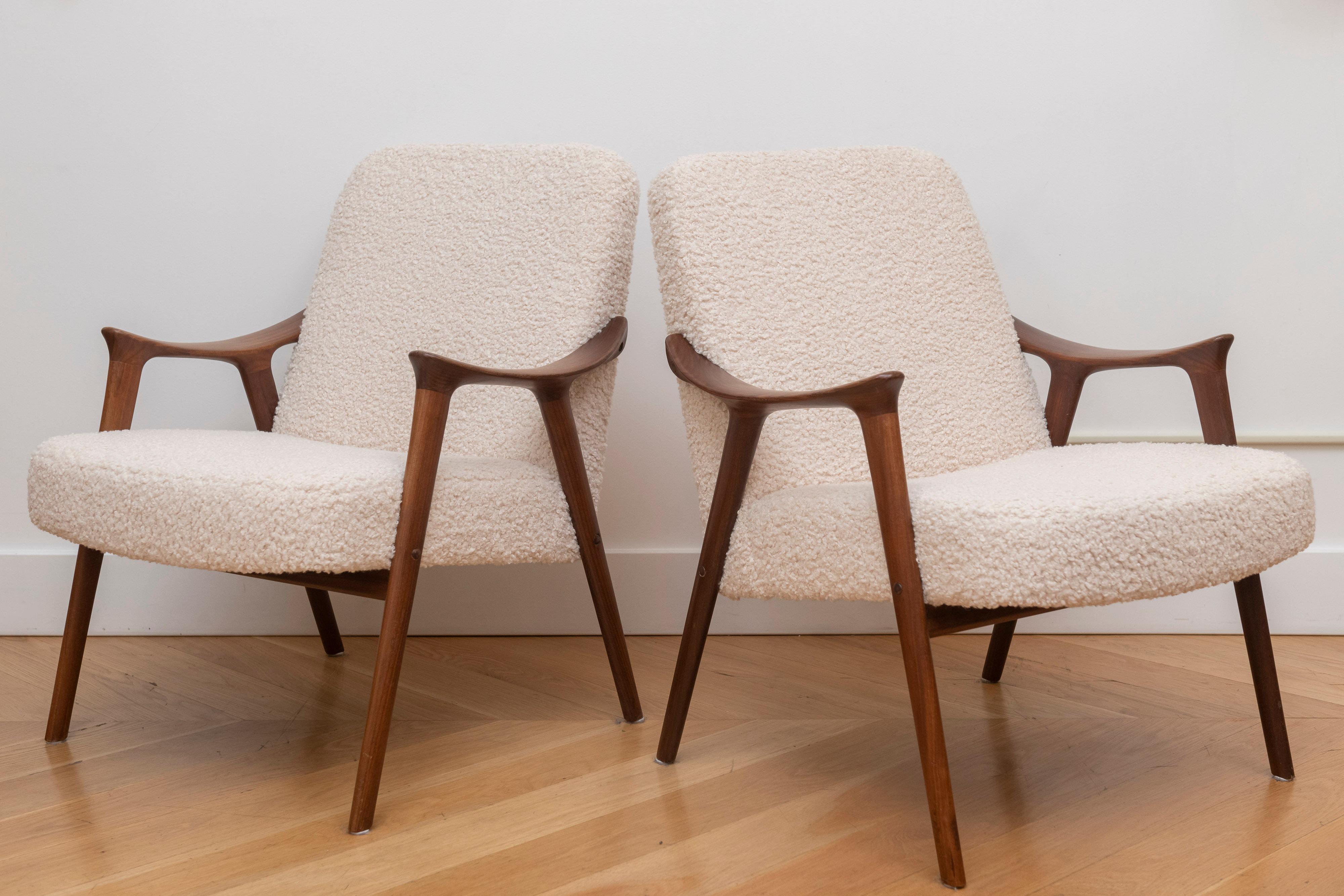 Stunning vintage armchairs in solid afromosia wood, designed by Ingmar Relling for Westnofa in the 1960s.
The condition is superb throughout, we have had this newly upholstered in a lovely bouclé fabric. The frame is clean, sturdy and sound, with