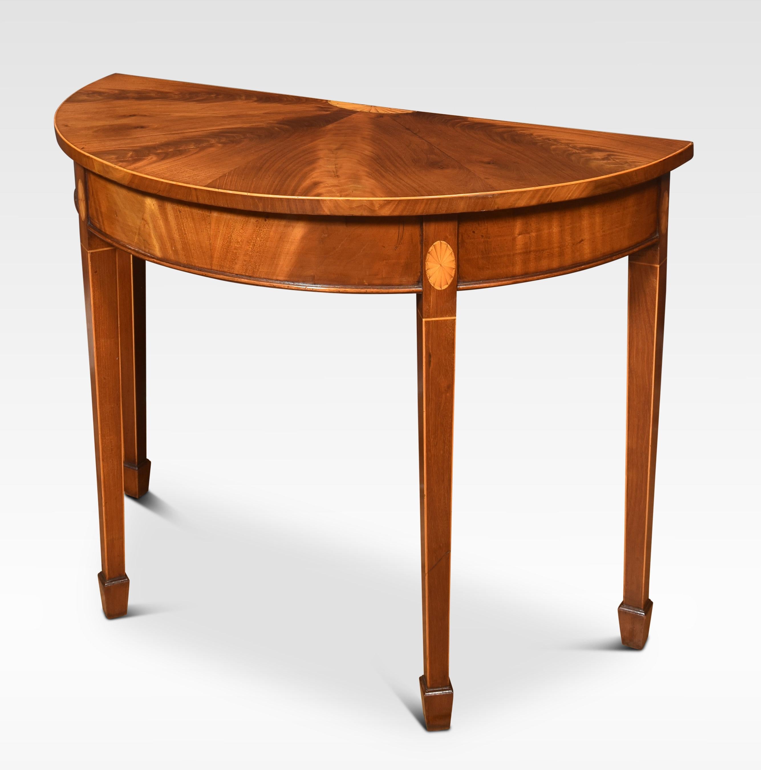 Pair of hall tables the well-figured half-round tops above inlaid frieze with satinwood stringing. All raised up on tapering legs, terminating in spade feet.
Dimensions
Height 30 Inches
Width 39.5 Inches
Depth 19 Inches