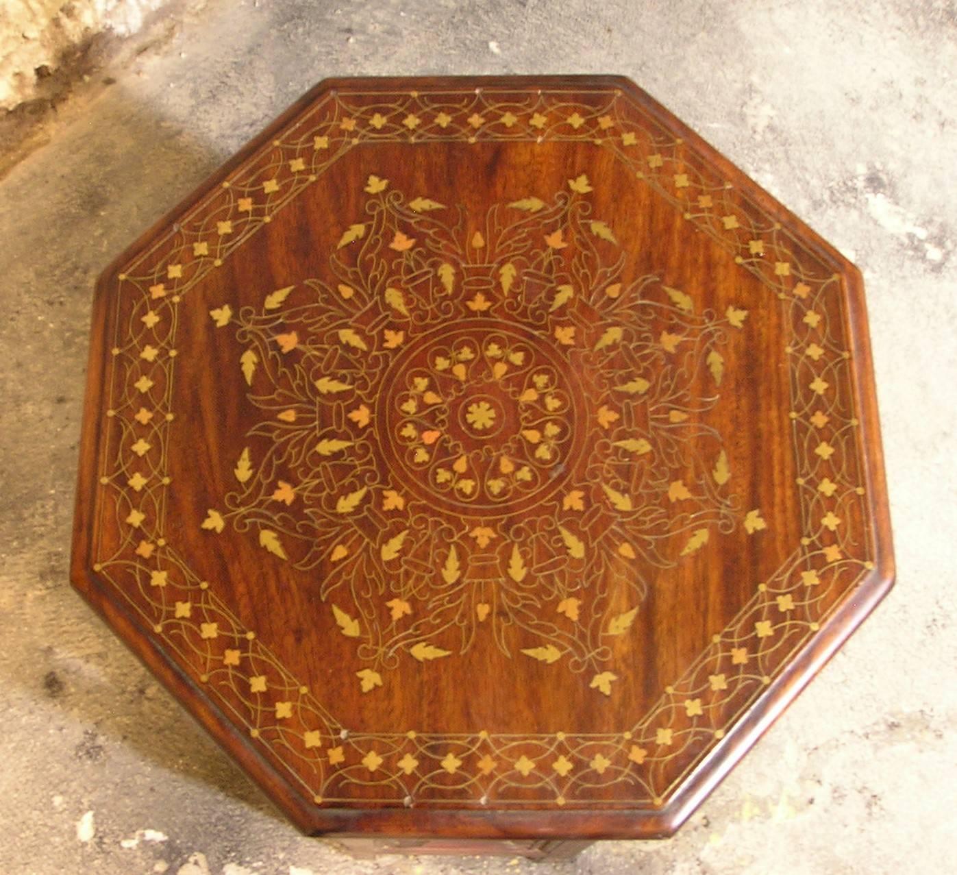 Pair of finely carved and inlaid Anglo-Indian octagonal traveling side or end tables with copper and brass inlay.
