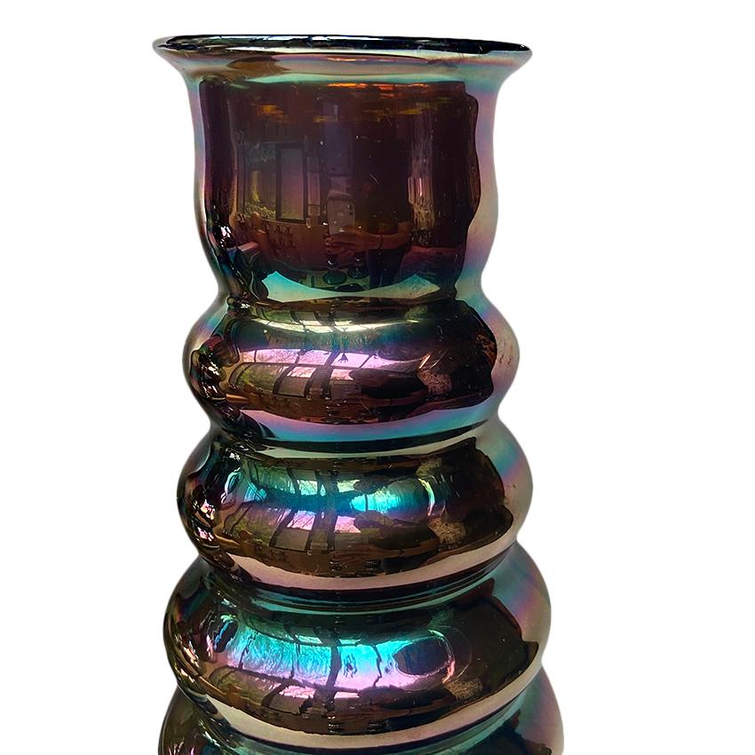 Pair of circa 1930's French hand-blown iridescent glass vases.

Measurements:
Height: 10