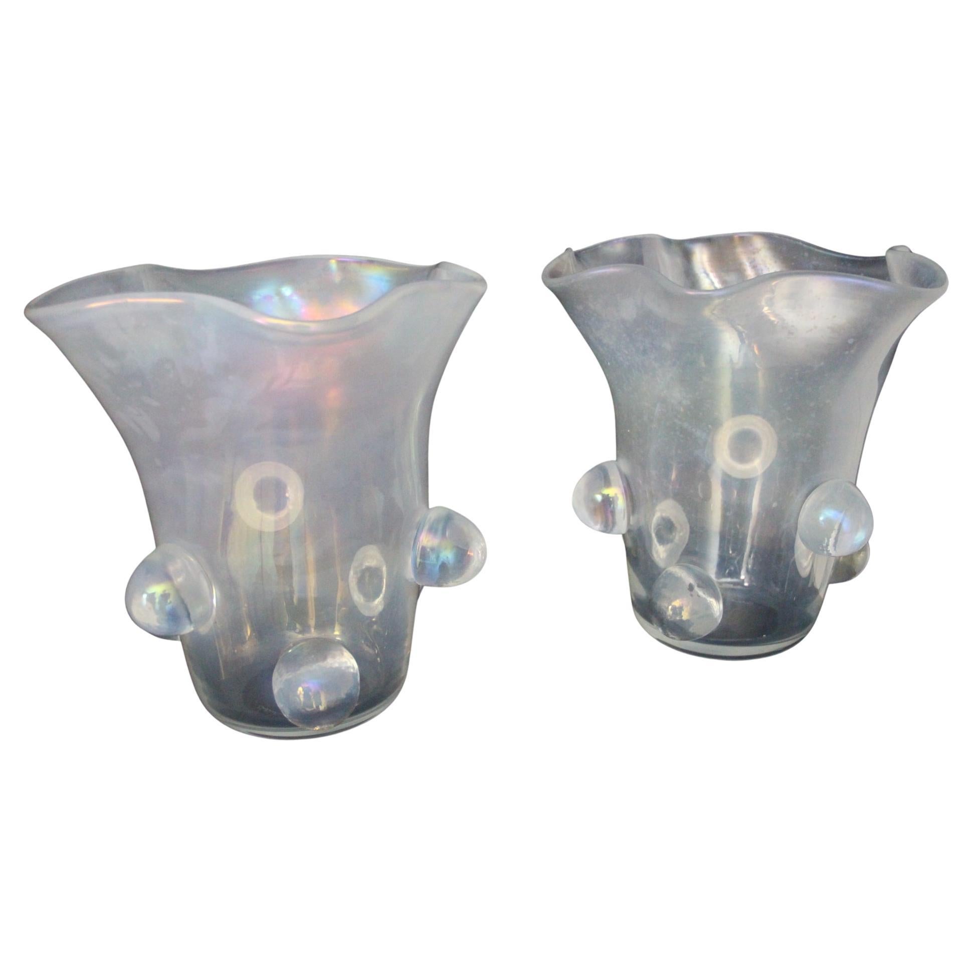 These spectacular free-form iridescent mother-of-pearl color Murano glass vases feature very large glass buttons all around. Its applied glass buttons add dimension and depth to the surface of the glass. All hand made in Murano, these vases are very