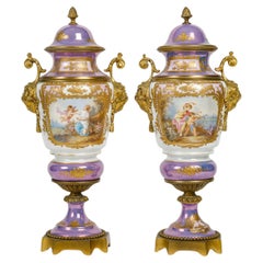 Pair of Iridescent Sèvres Porcelain and Gilt Bronze Covered Vases, 19th Century.