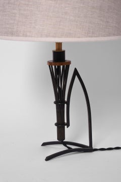 Pair of iron and copper lamps, 1940s.