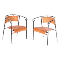 Vintage Pair of iron and rattan armchairs
